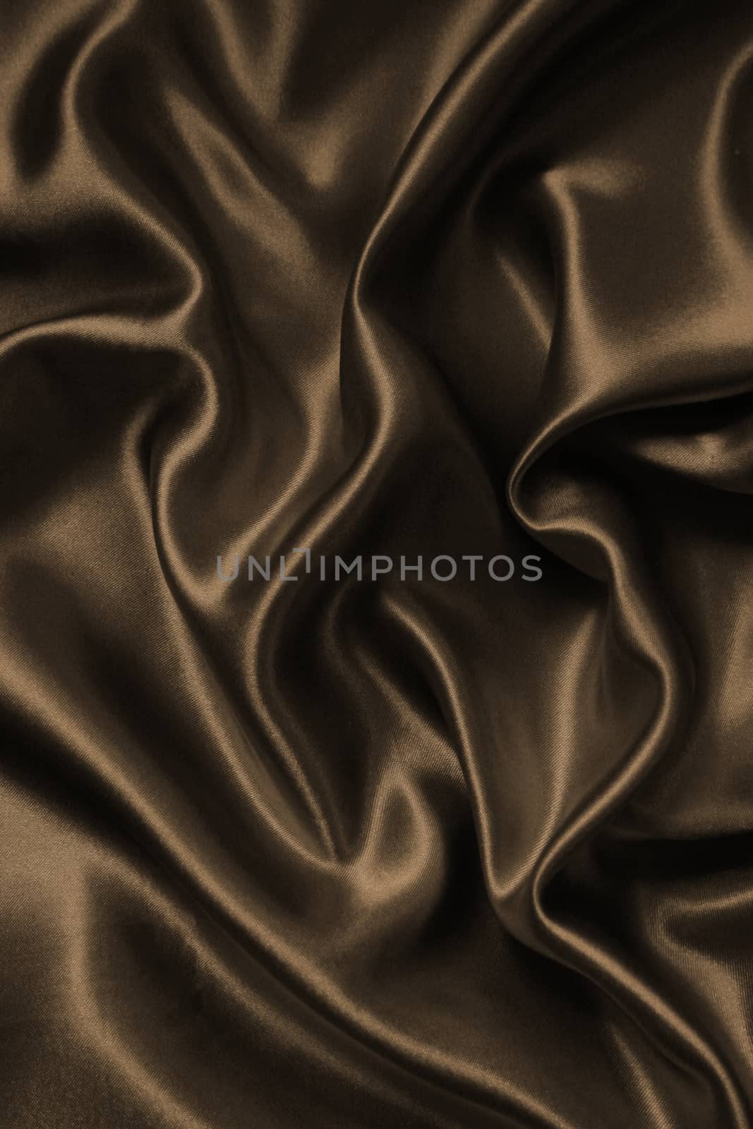 Smooth elegant brown chocolate silk as background  by oxanatravel