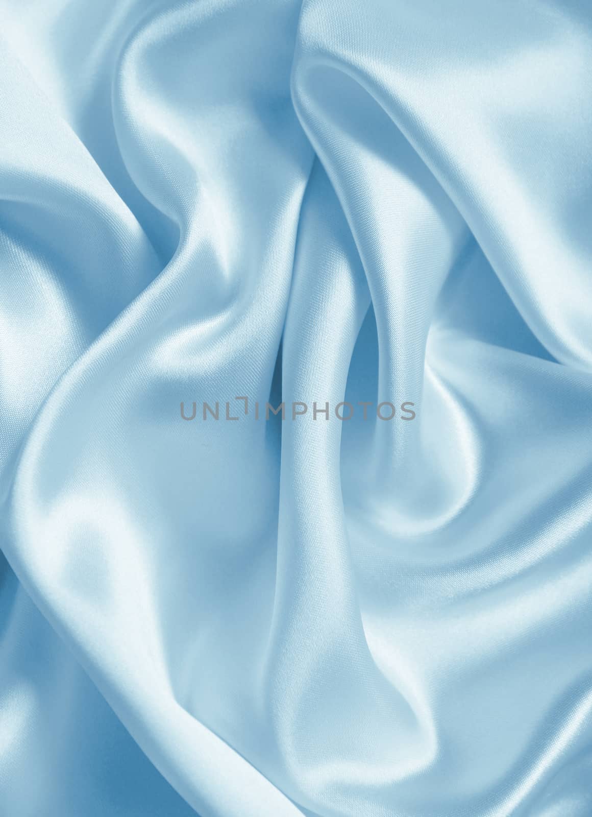 Smooth elegant blue silk or satin texture can use as background