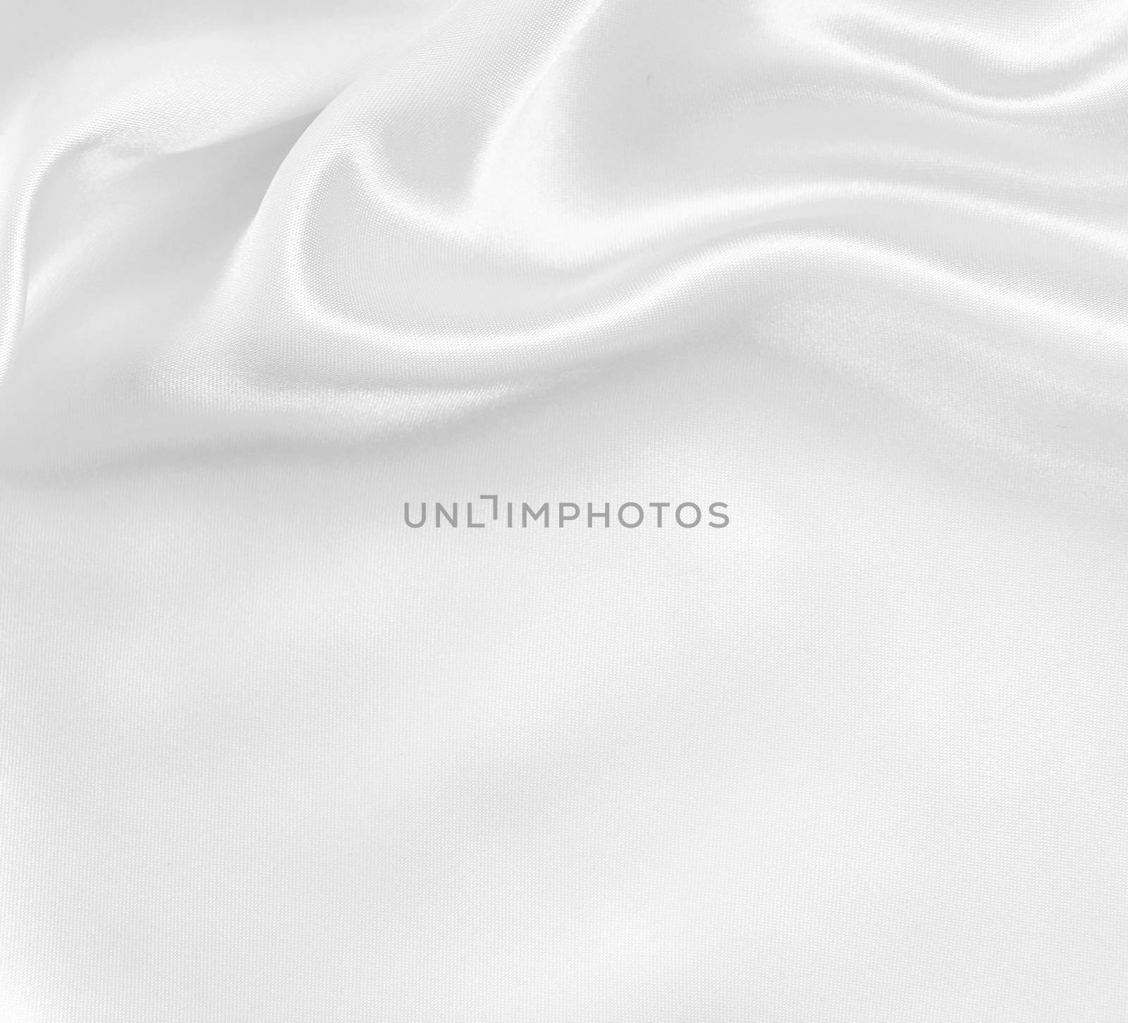 Smooth elegant white silk or satin texture as wedding background by oxanatravel