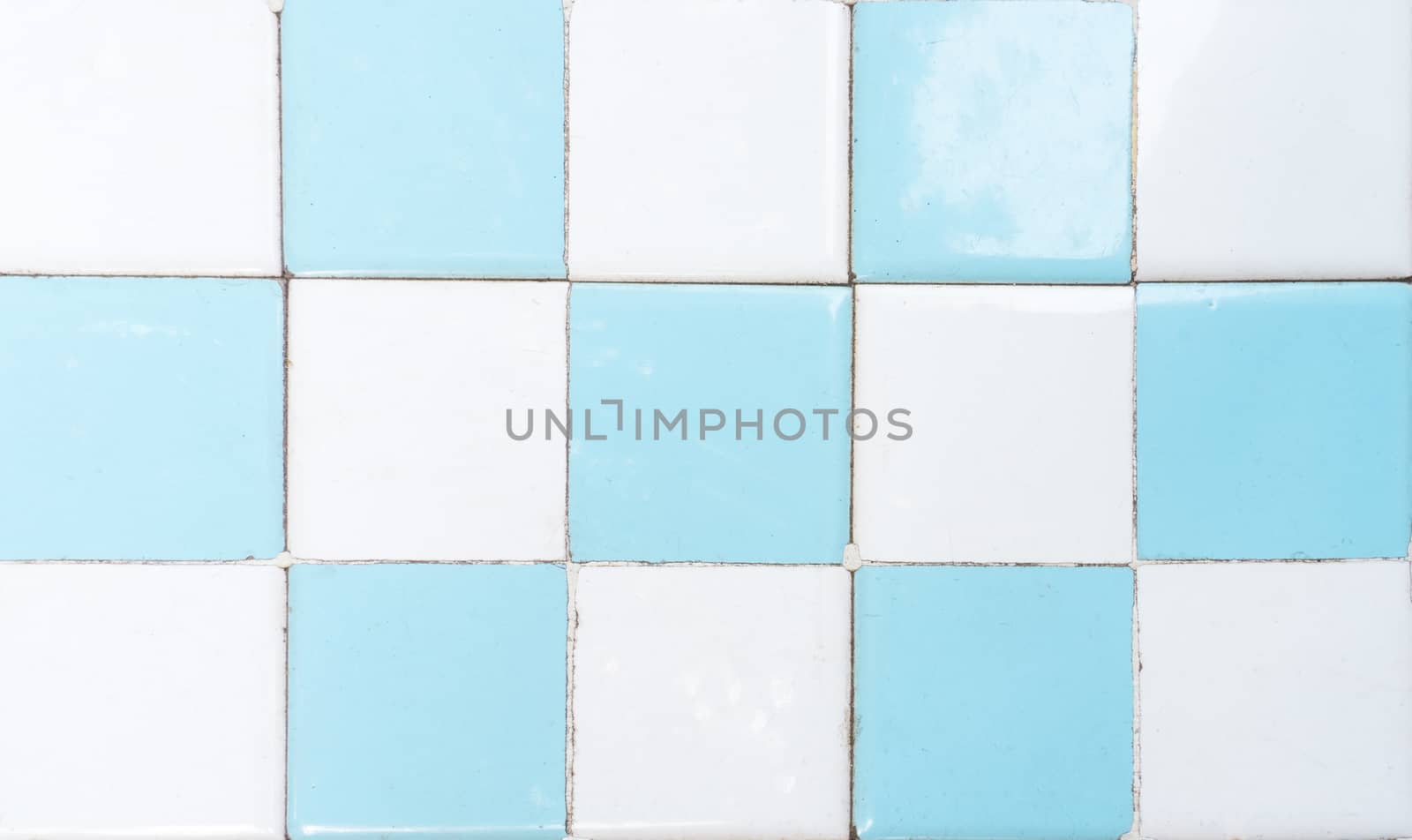 White and Blue Restroom Tile Wall with Chess Pattern