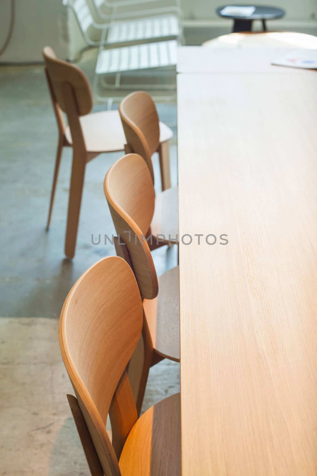 View of wooden chairs and table in the big room