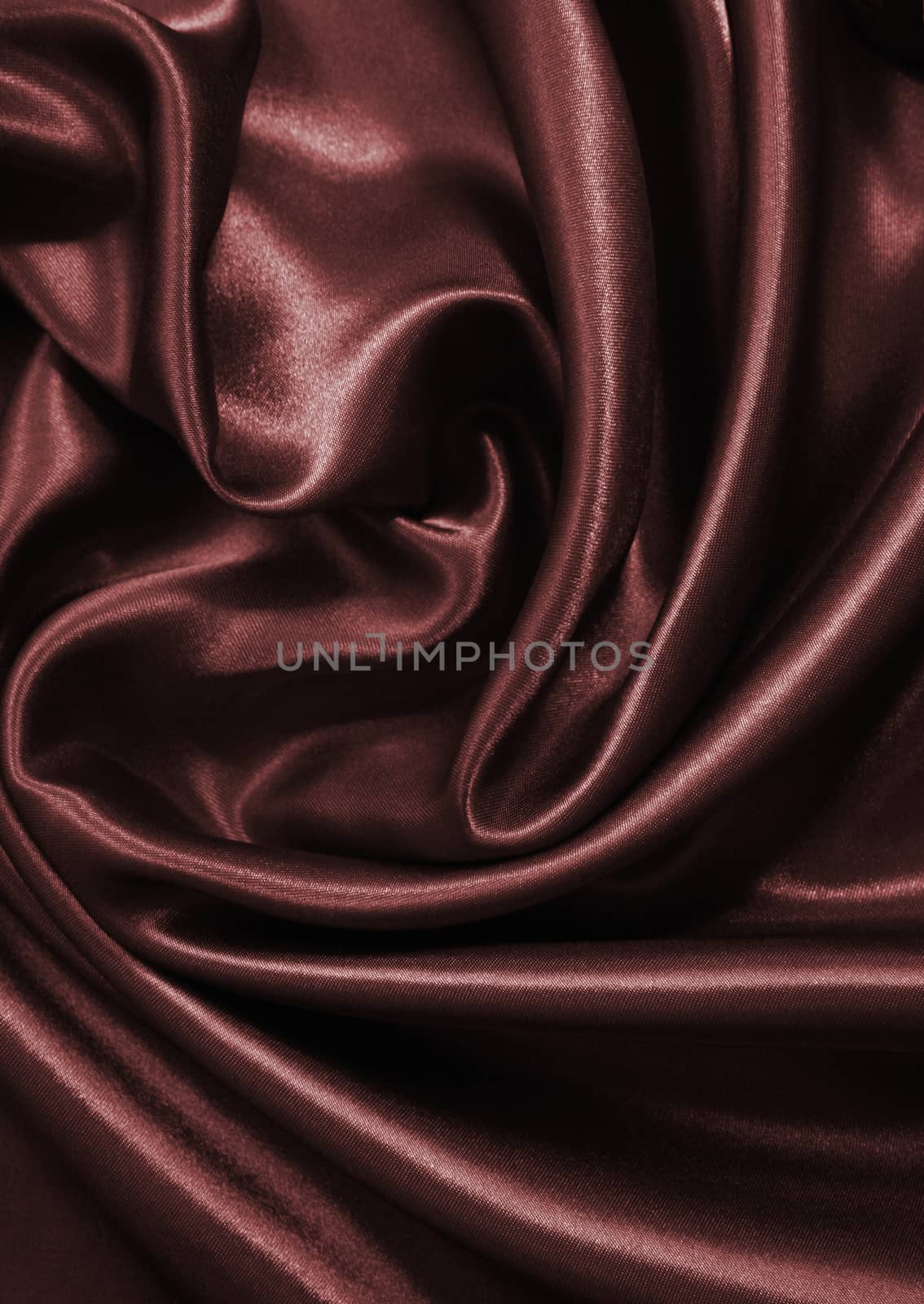 Smooth elegant dark brown chocolate silk can use as background 