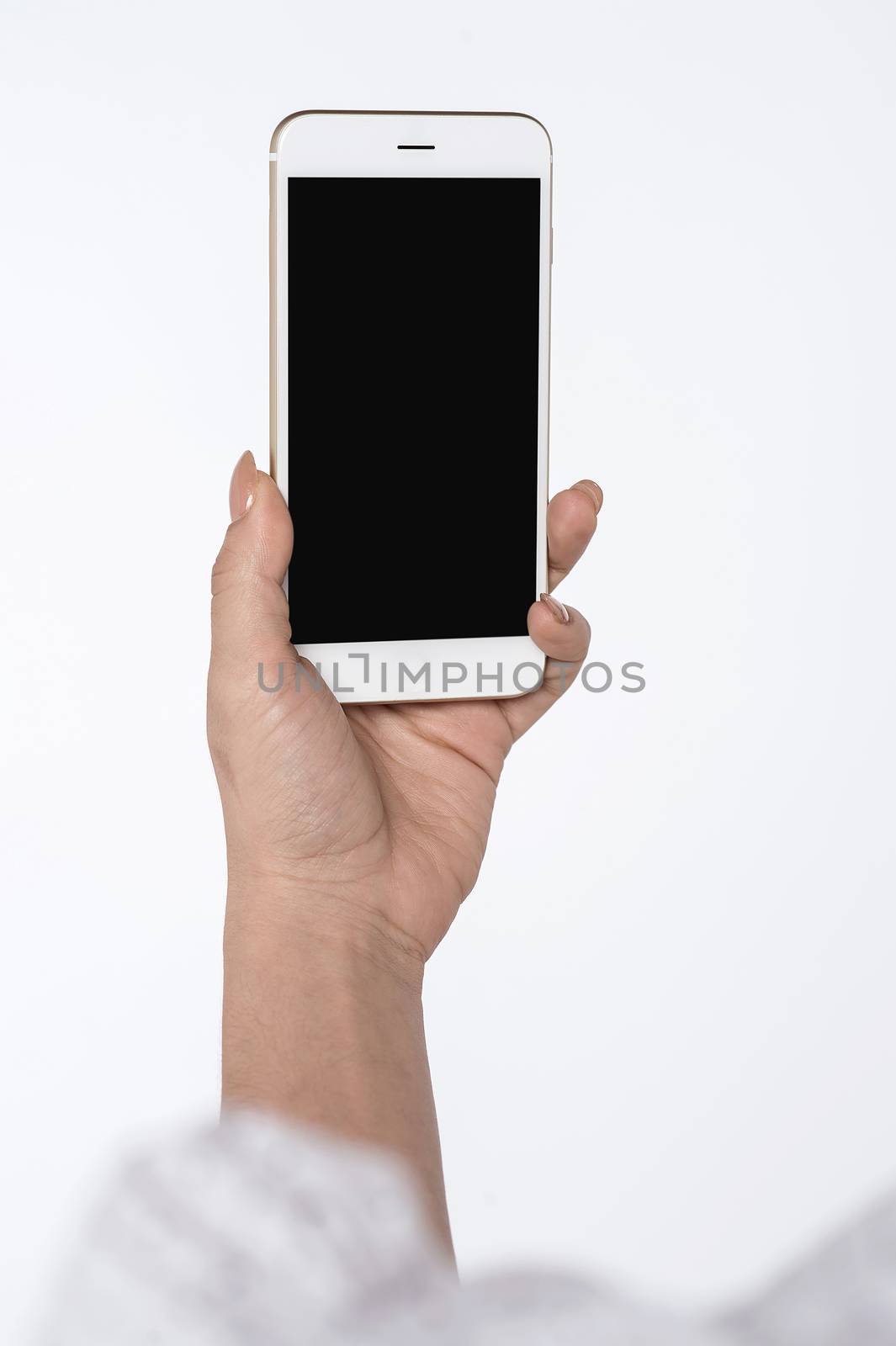 Female hand showing a new smart phone