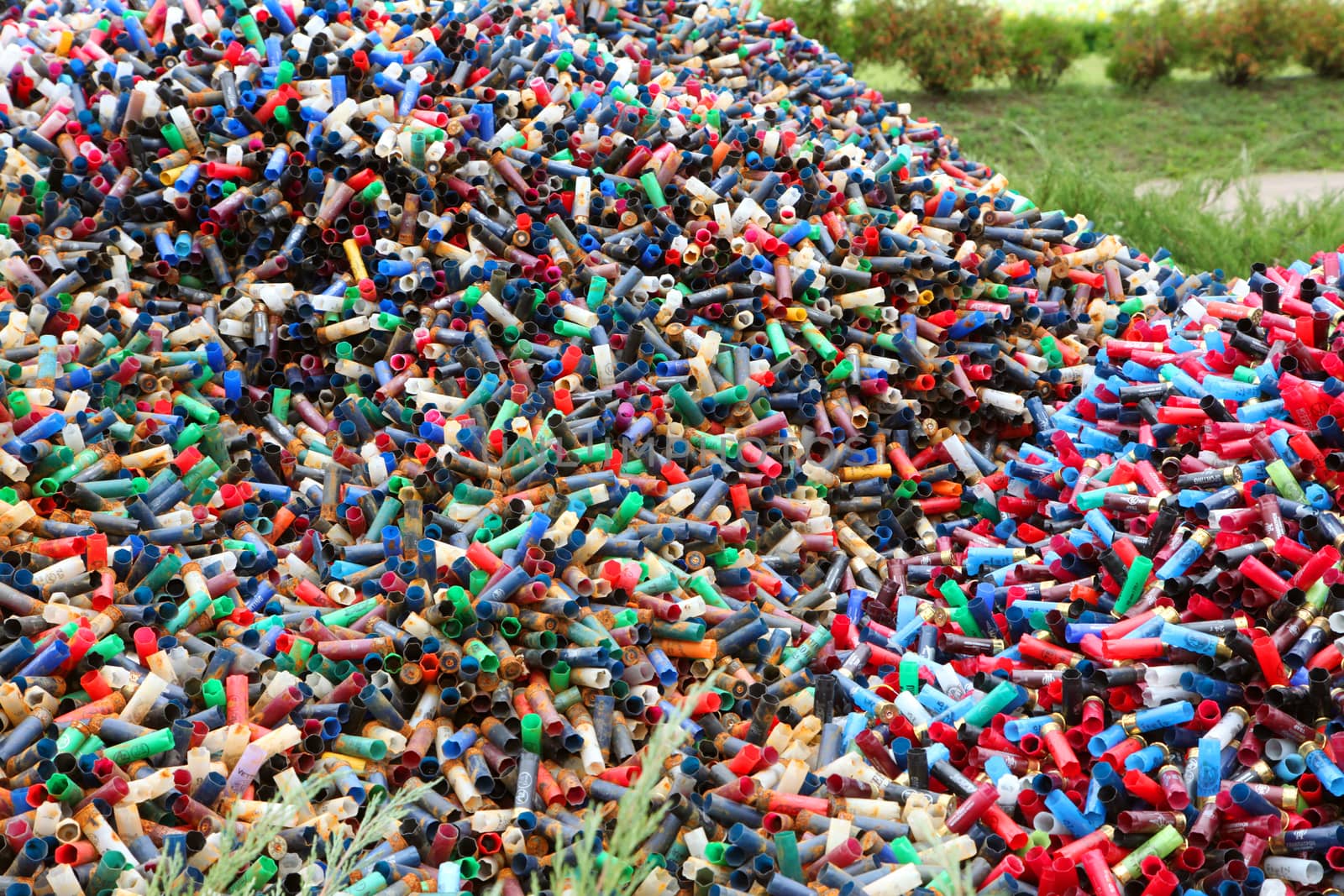 Many used empty cartridges from a shotgun cartridges.