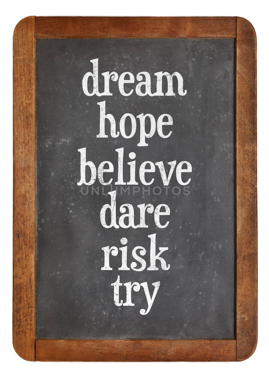 dream, hope, believe, dare, risk try - a set of motivational words n on a vintage slate blackboard