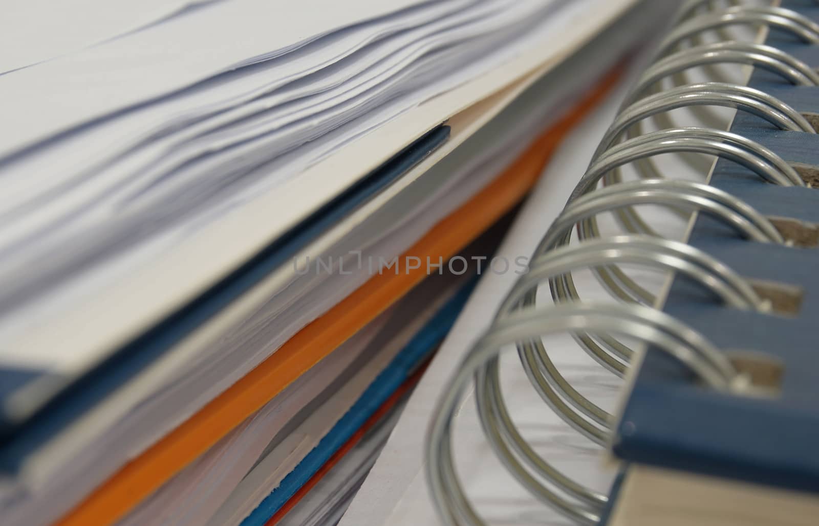 Notebook and pile of document by ninun