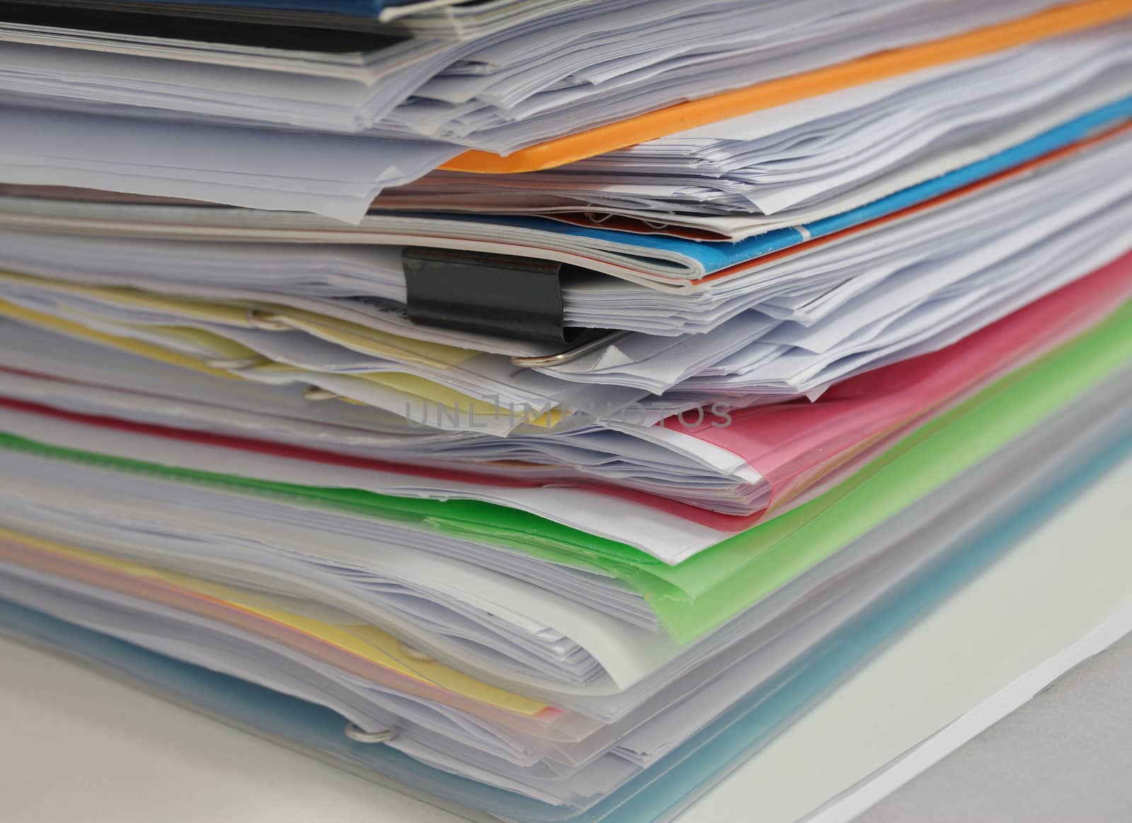 Pile of document on desk by ninun