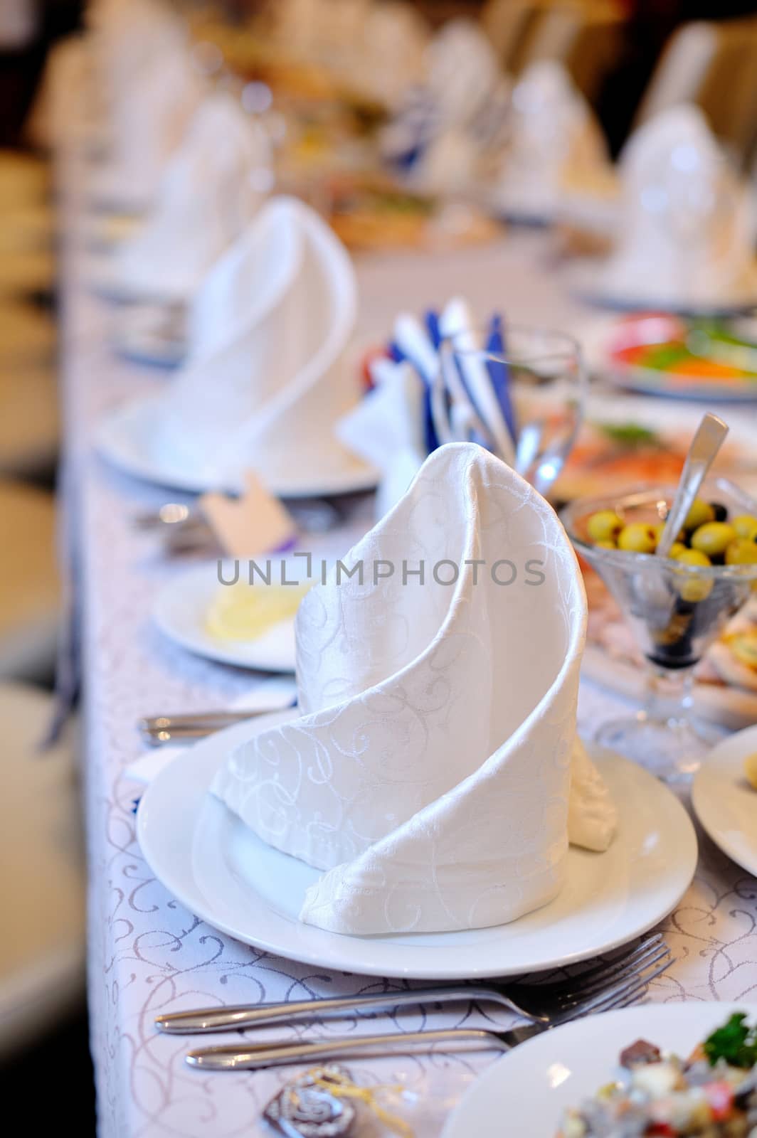 Ballroom decorated for wedding reception in restaurant