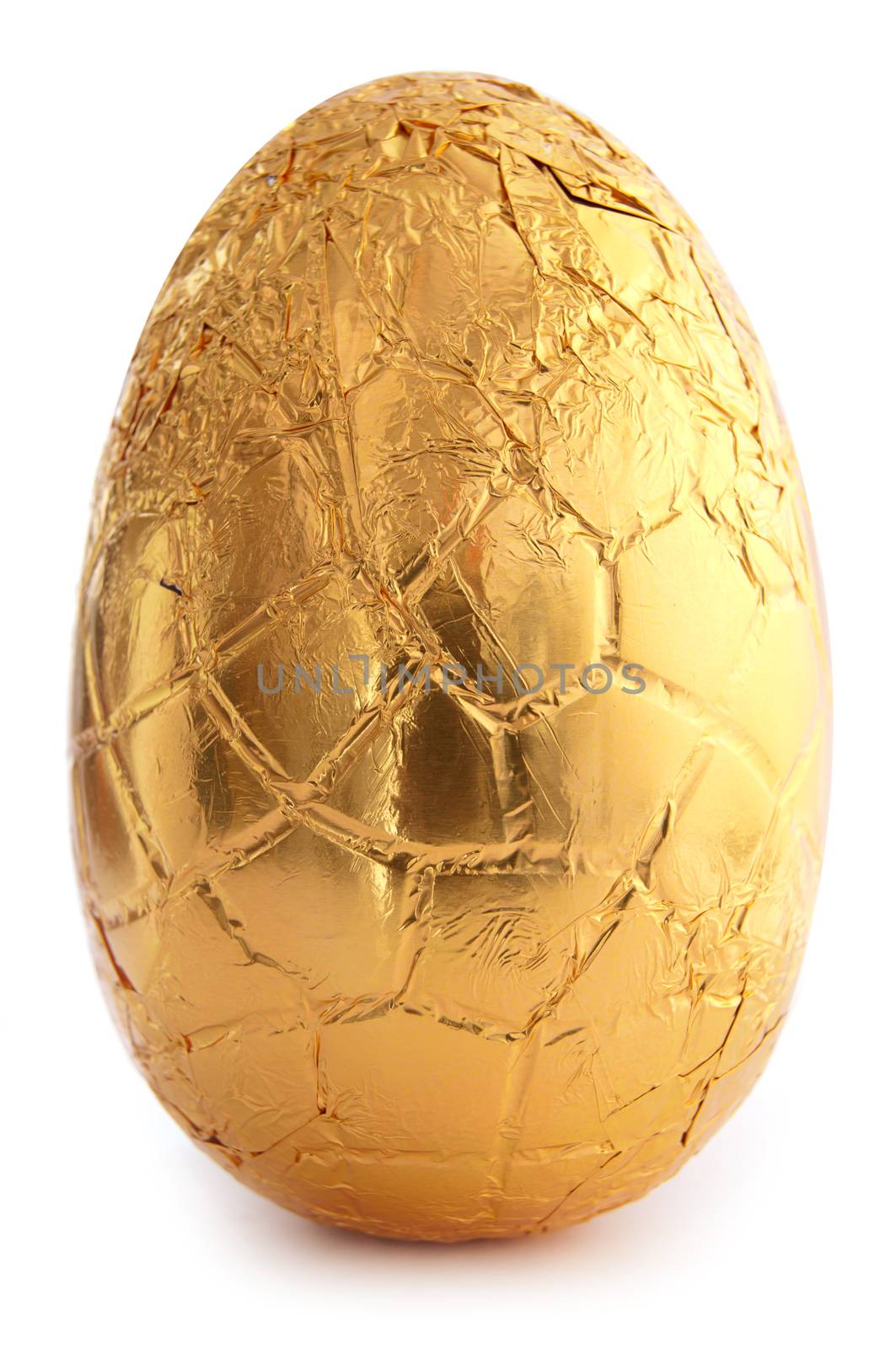 Gold easter egg over a white background