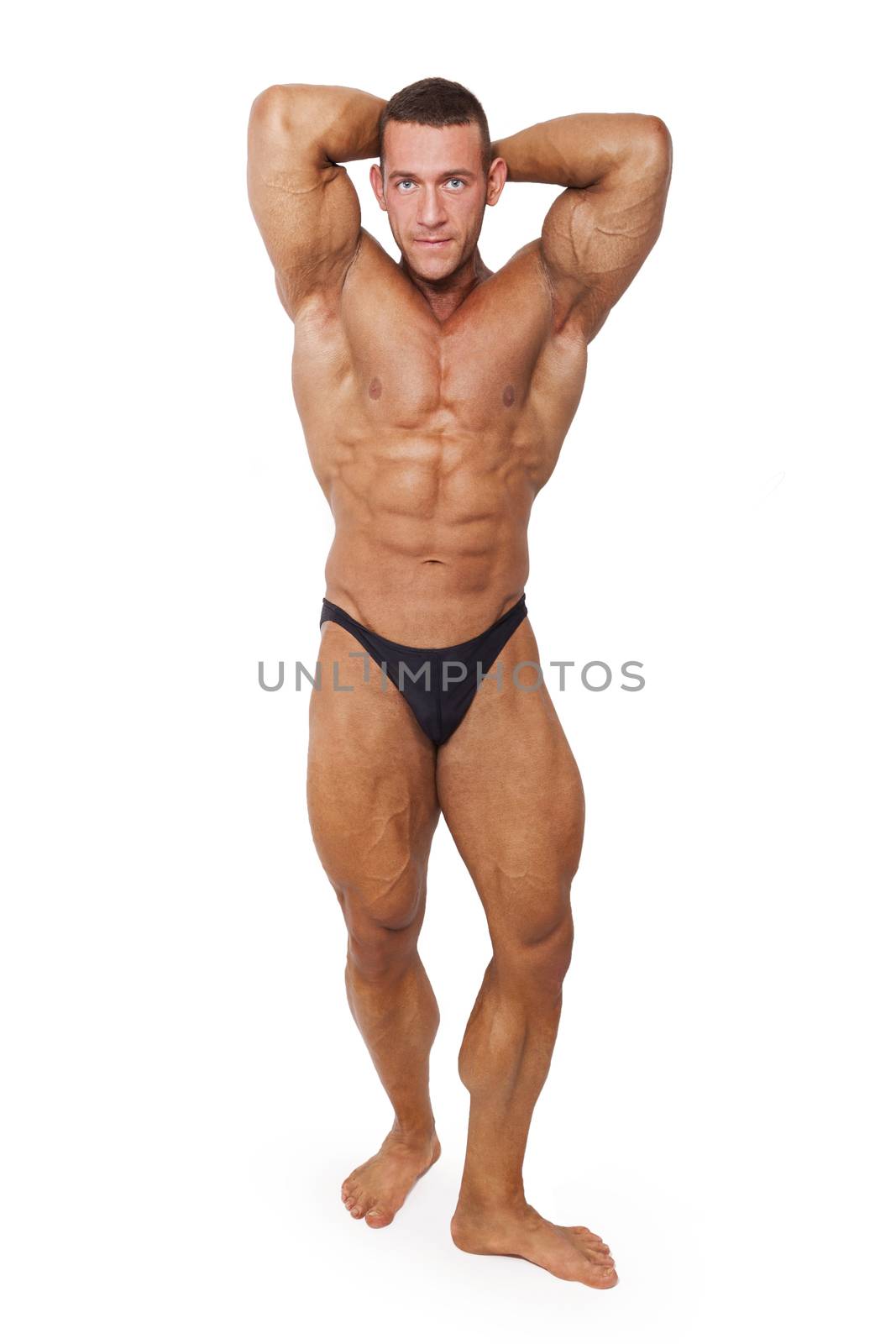 Bodybuilder posing isolated.  by eskymaks