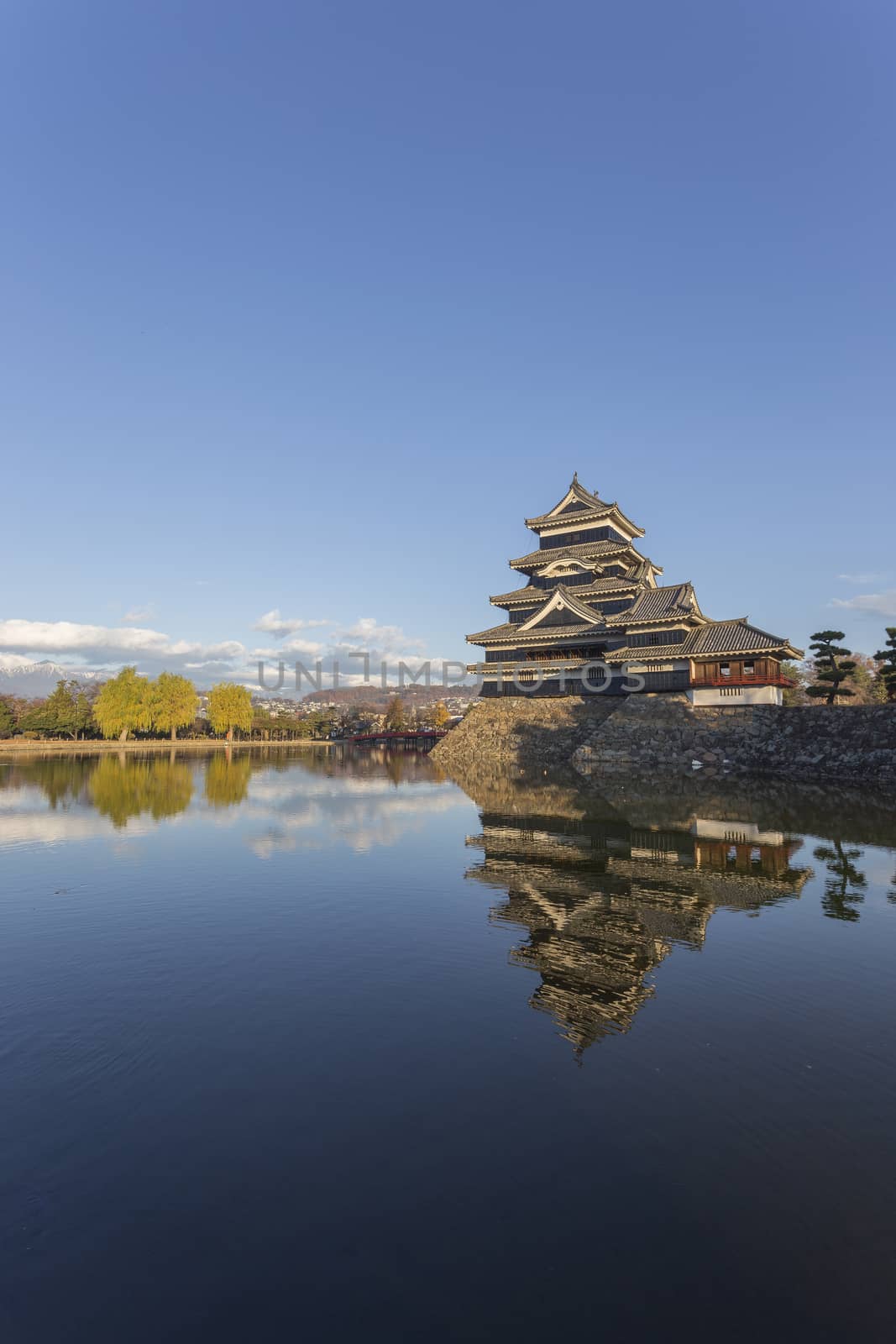 This photo was shot from Matsumoto Castle, Japan in early morning. The soft sunlight touch the castle is so beautiful. 