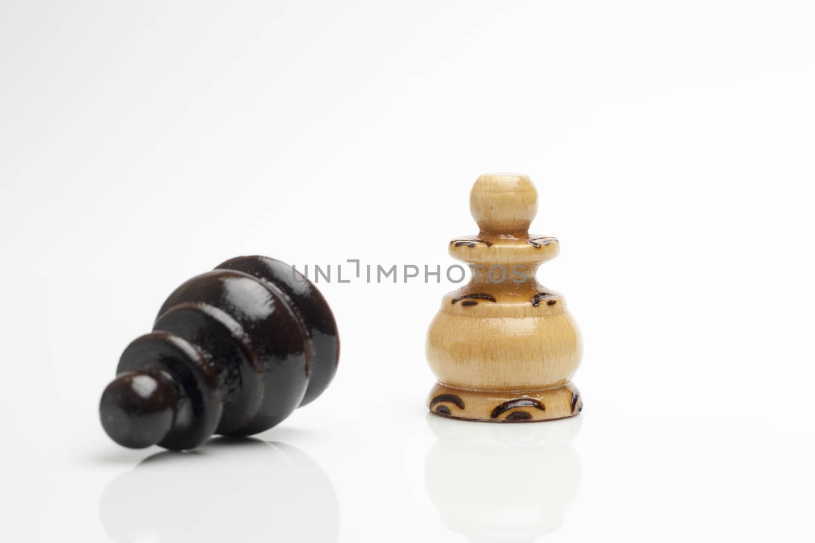 White and black chess figures on white background