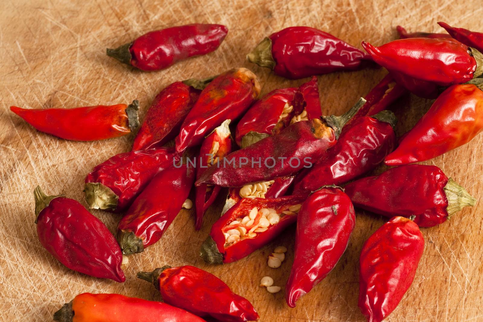 red hot chili peppers on a cutting board