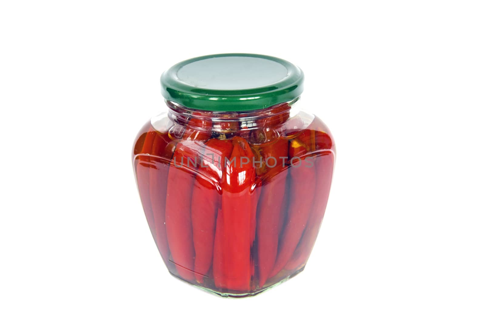 ecological red hot chilli pepper paprika preserved canned in glass pot isolated on white
