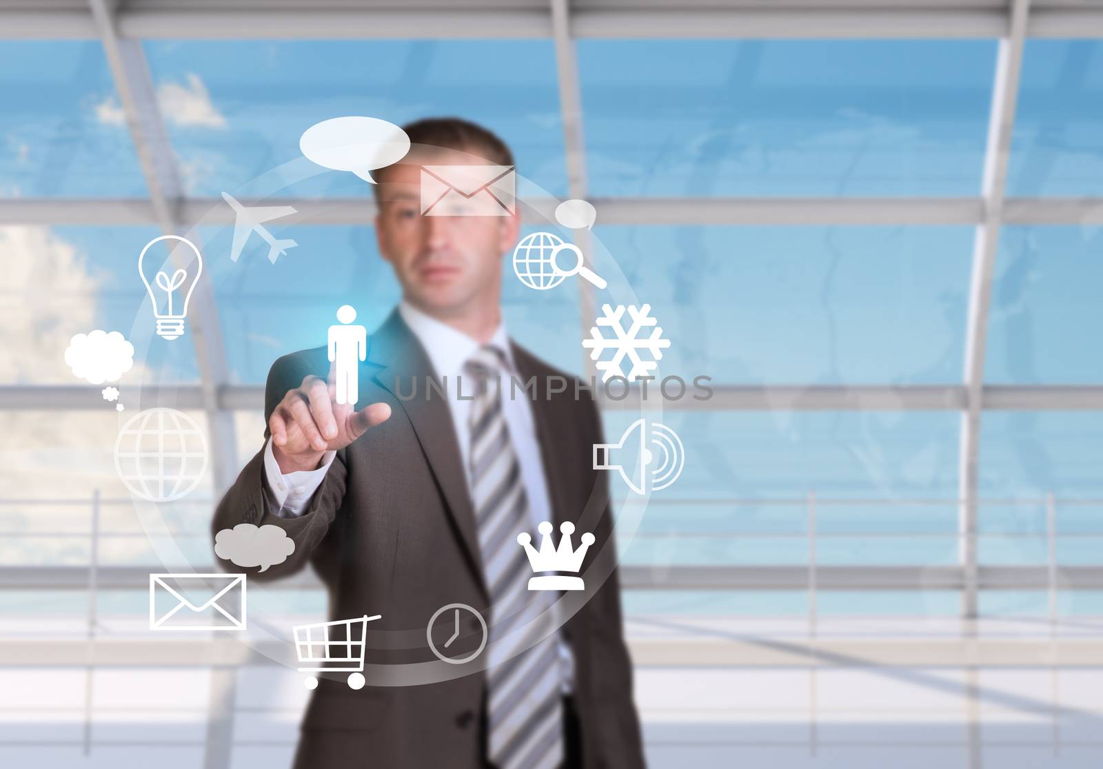 Businessman pressing on holographic screen with icons on window and map background