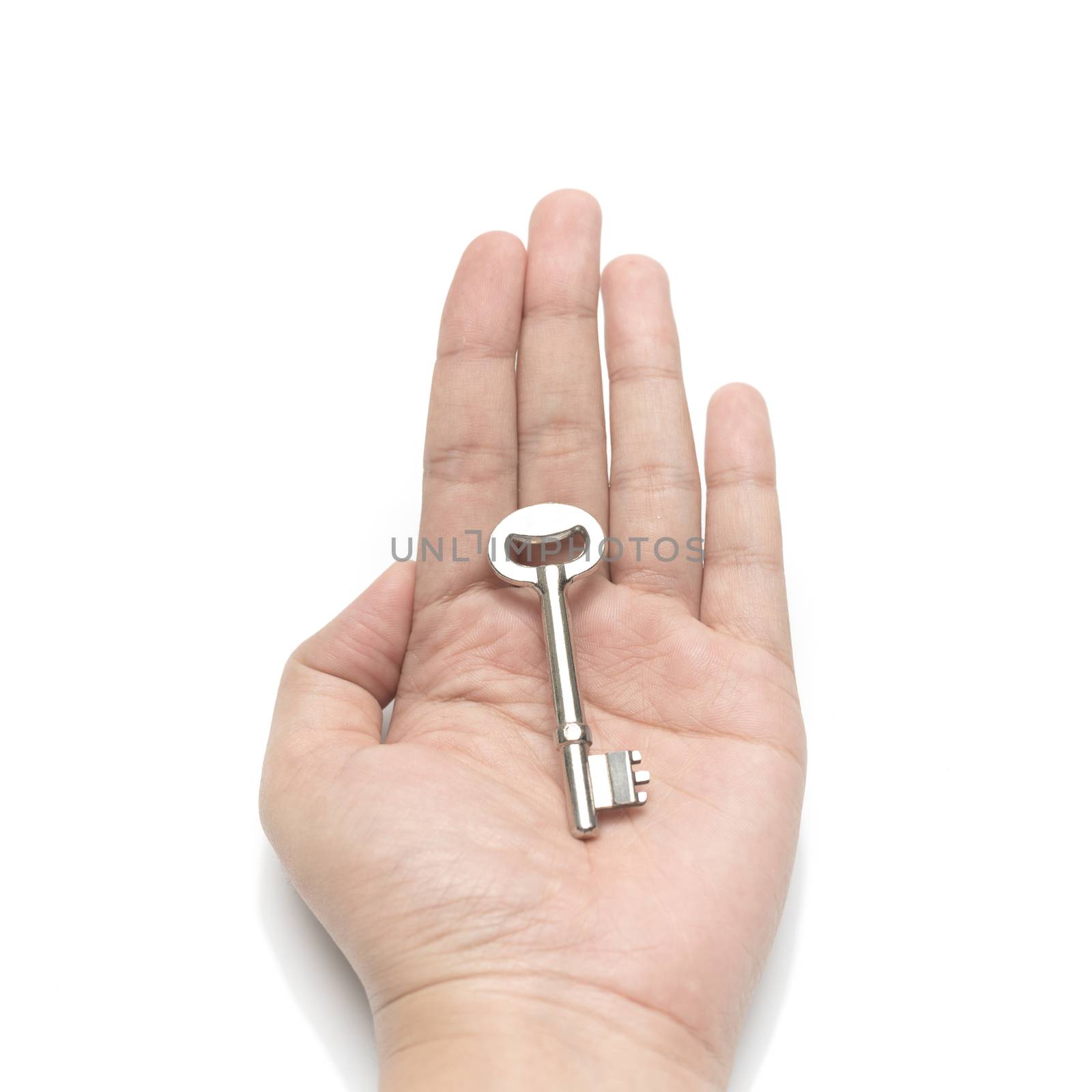 hand holding key isolated on white background