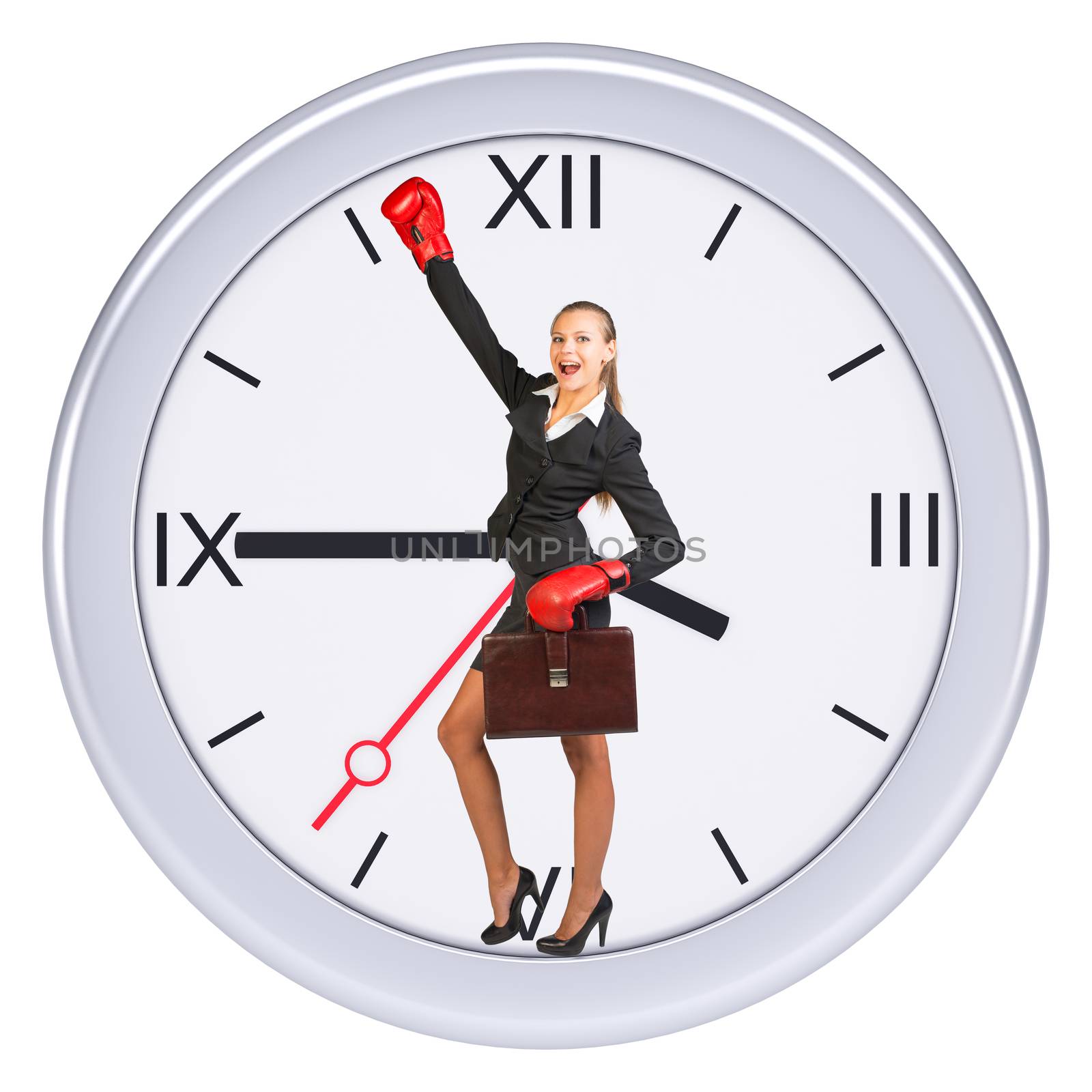 Businesswoman in boxing-gloves standing in center of clock on isolated white background