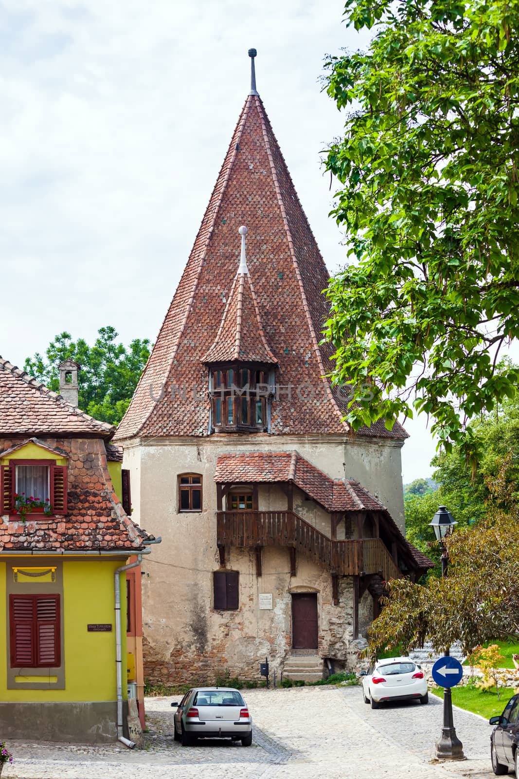 Sighisoara, Romania - June 23, 2013: Shoemakers tower (Turnul Cizmarilor) part of  Sighisoara fortress in Transylvania, Romania