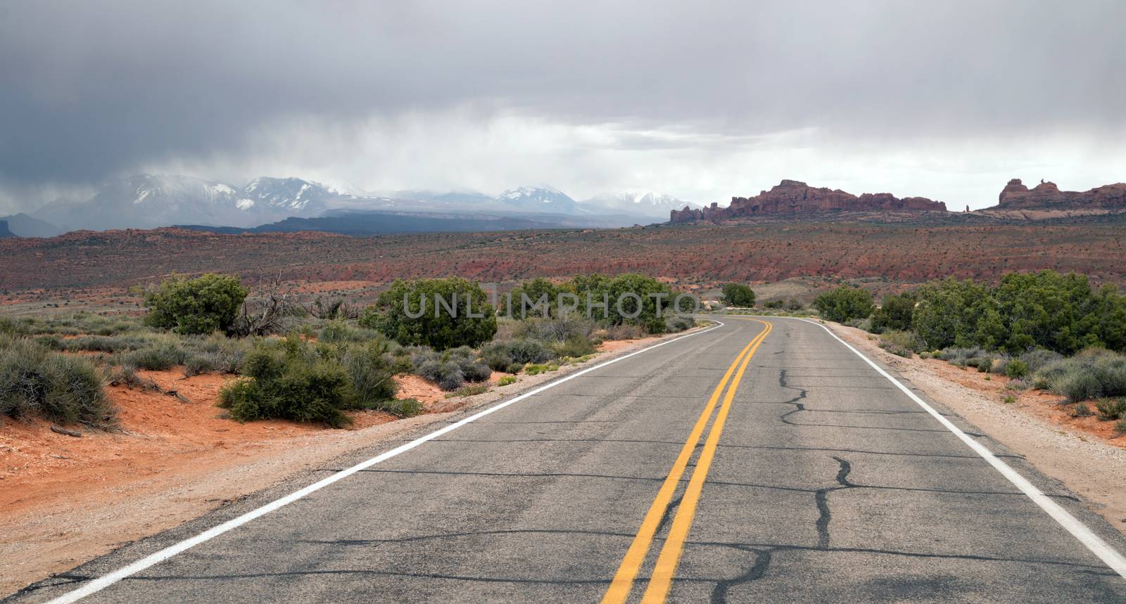 Rain clouds come over the mountains in the Utah desert