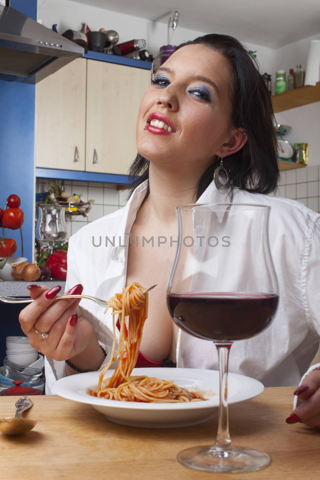 woman in underwear eating spaghetti