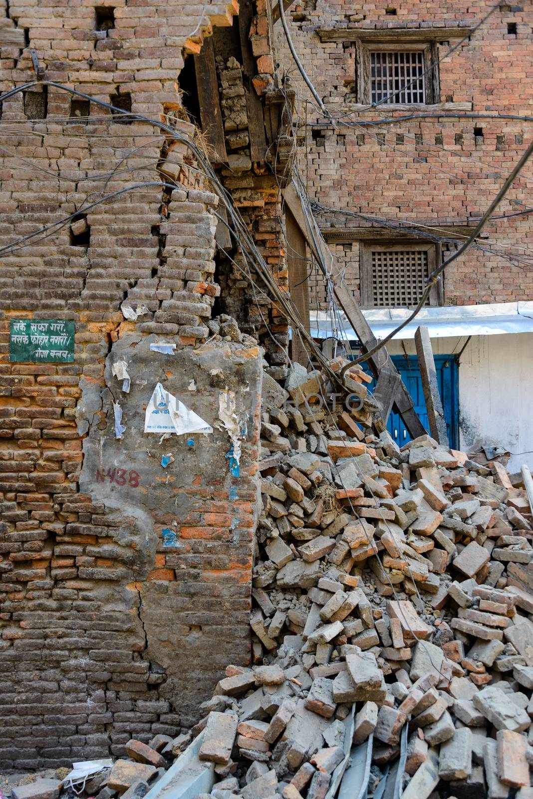 KATHMANDU, NEPAL - MAY 14, 2015: Damaged building and rubble after two major earthquakes hit Nepal in the past weeks.