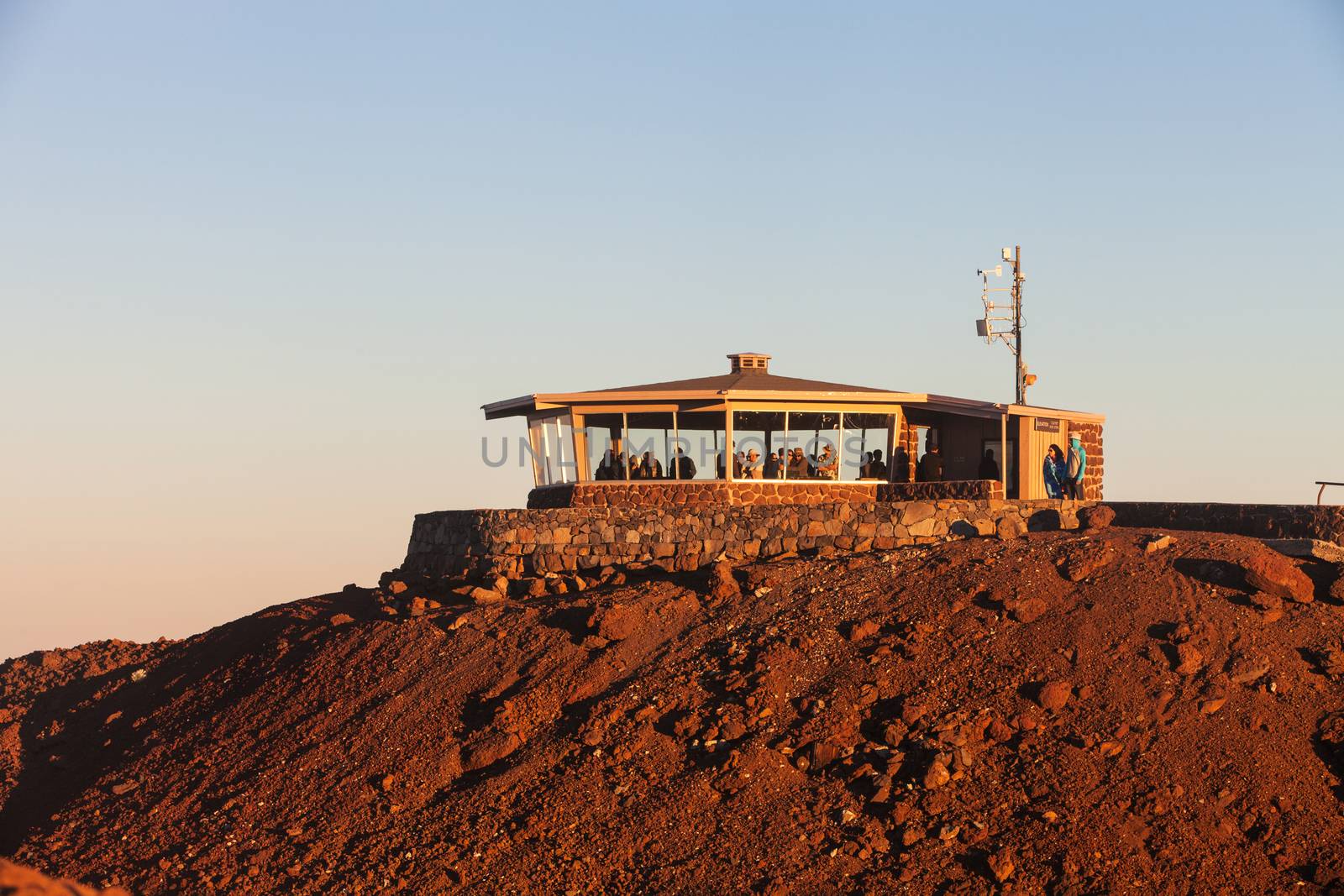 Tourists in observation building at Haleakala on Maui