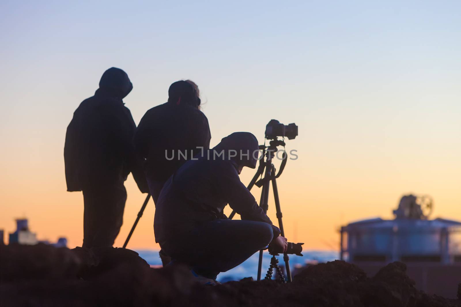 Tourists and photographers above Maui clouds from Haleakala