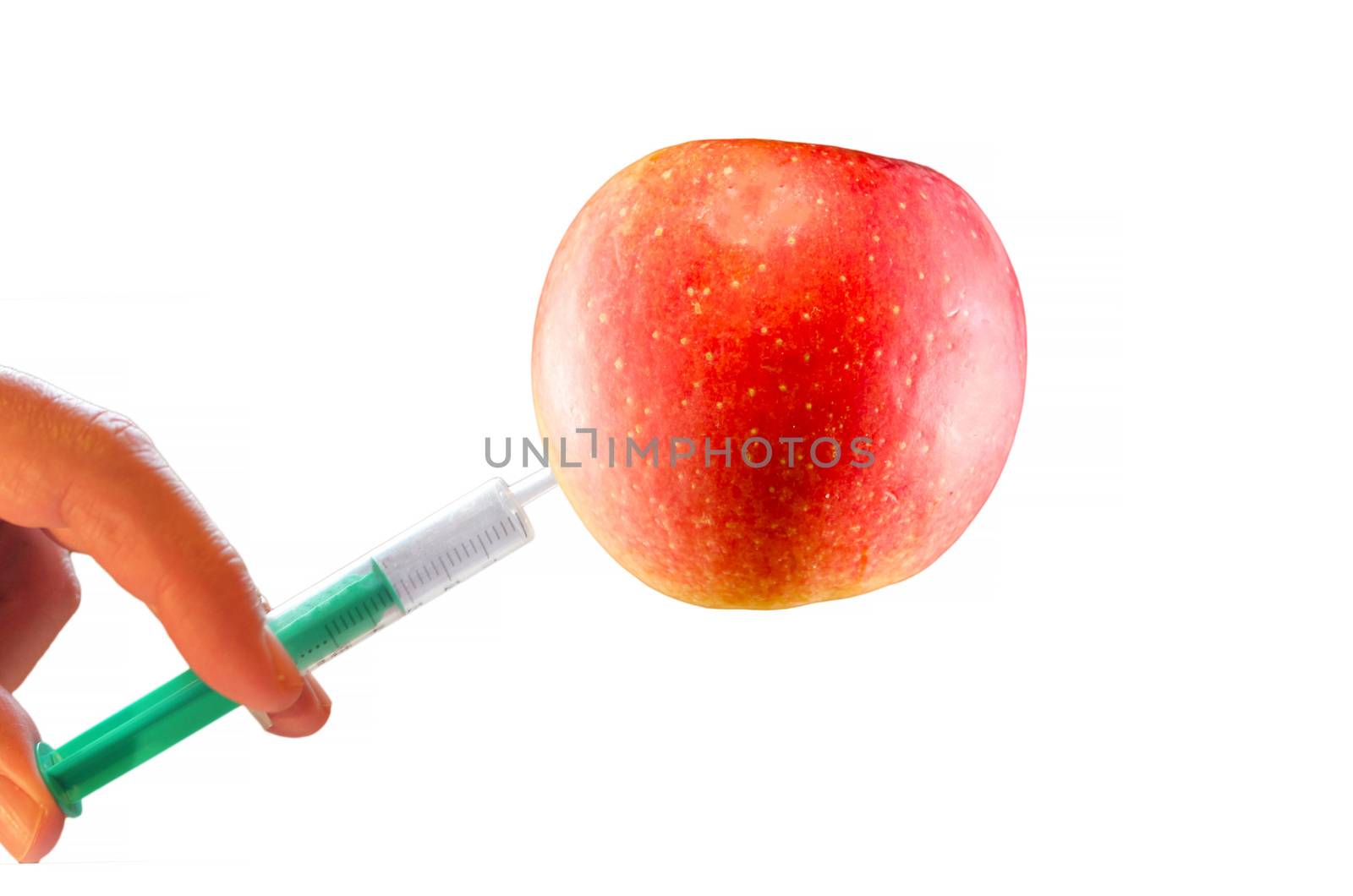 concept; Apple with vitamin Syringe isolated on white