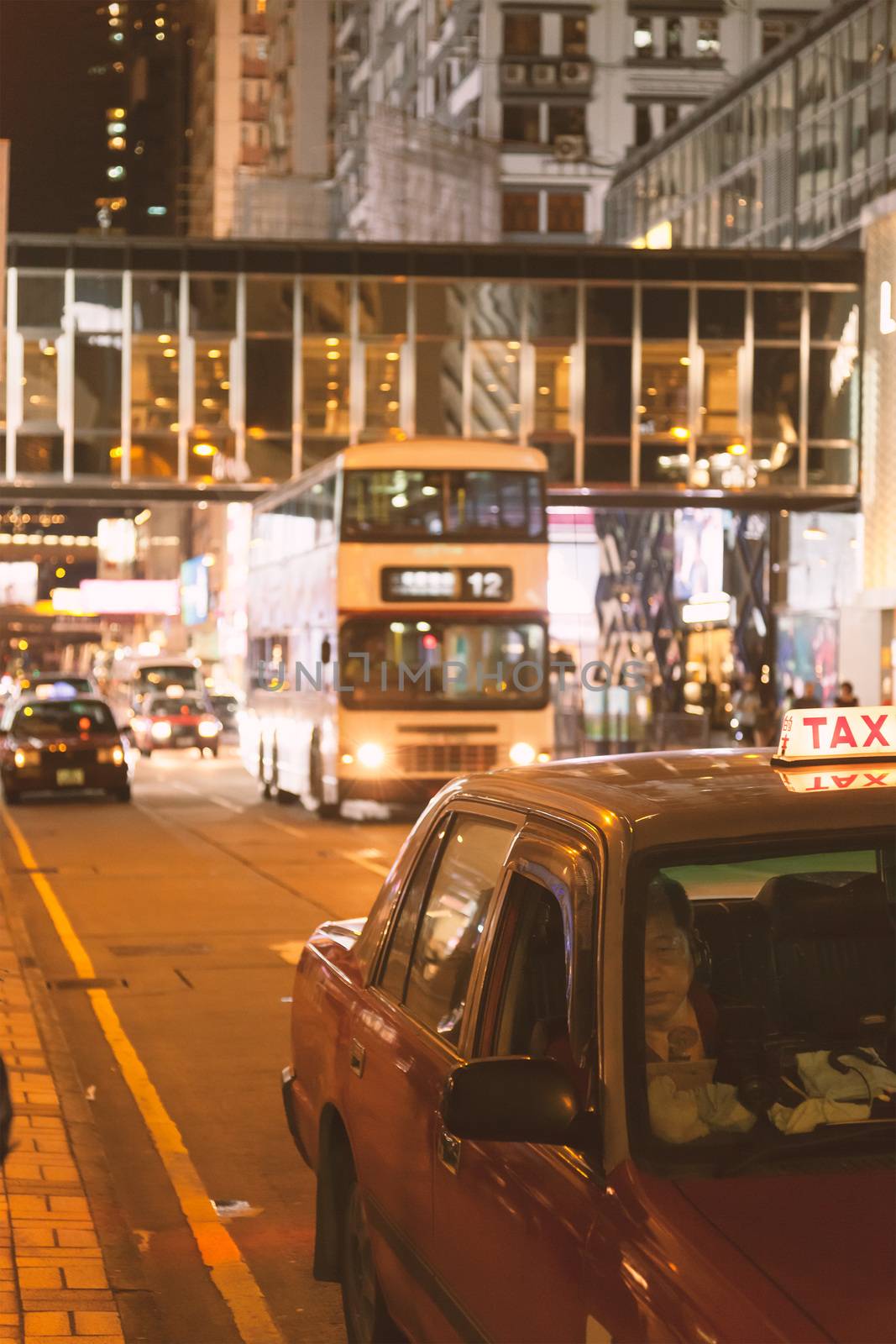 Movement of cars at night on the street in Tsim Sha Tsui, Hong Kong, China, 21 June, 2013.