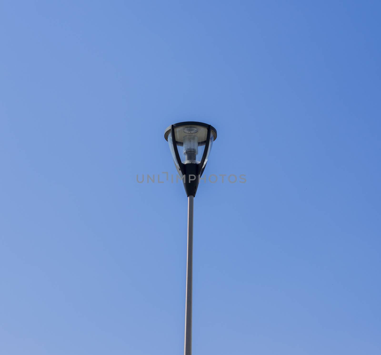 street lamp on blue sky background . For your commercial and editorial use