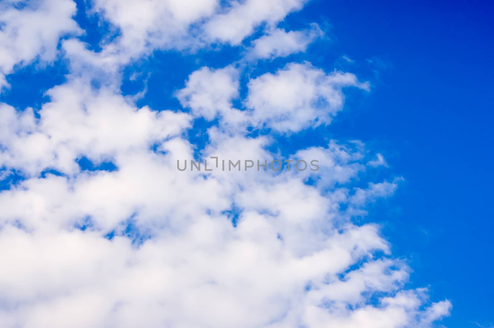 beautiful blue sky background with white clouds. by serhii_lohvyniuk