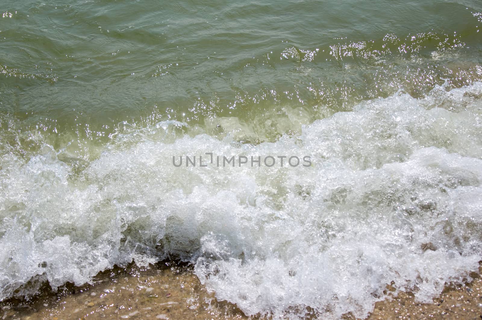 Sand beach and wave. For your commercial and editorial use.