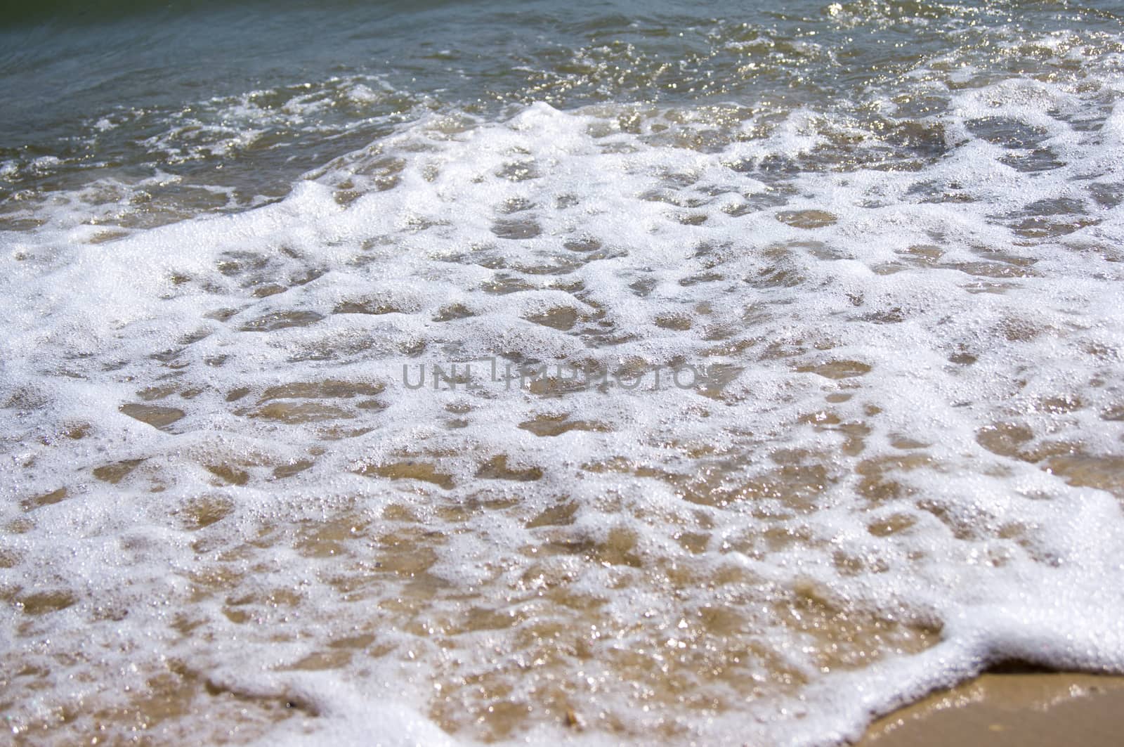 Sand beach and wave. For your commercial and editorial use.