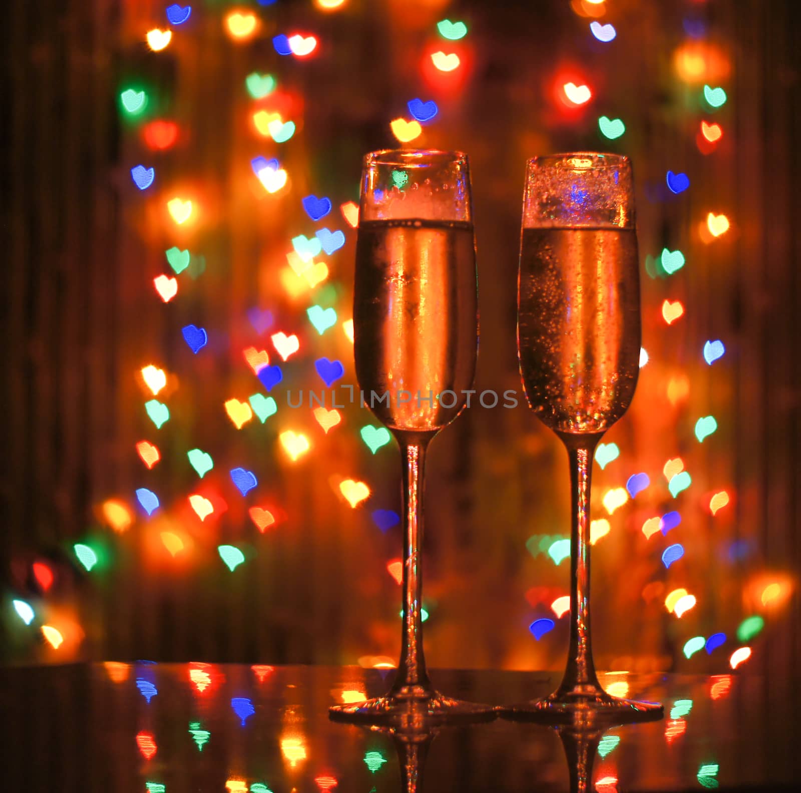 glass of champagne on the background bokeh by serhii_lohvyniuk