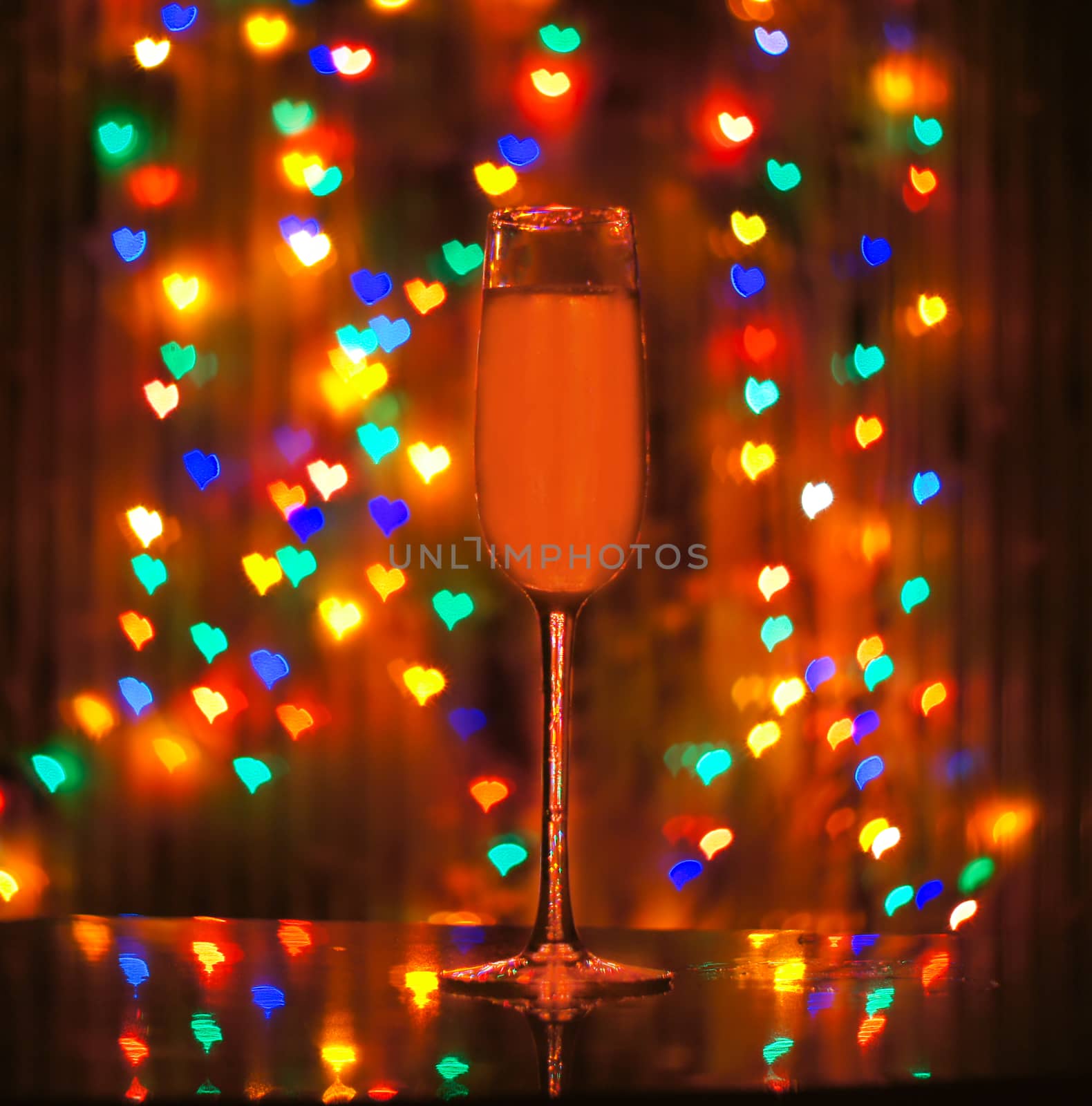 glass of champagne on the background bokeh by serhii_lohvyniuk