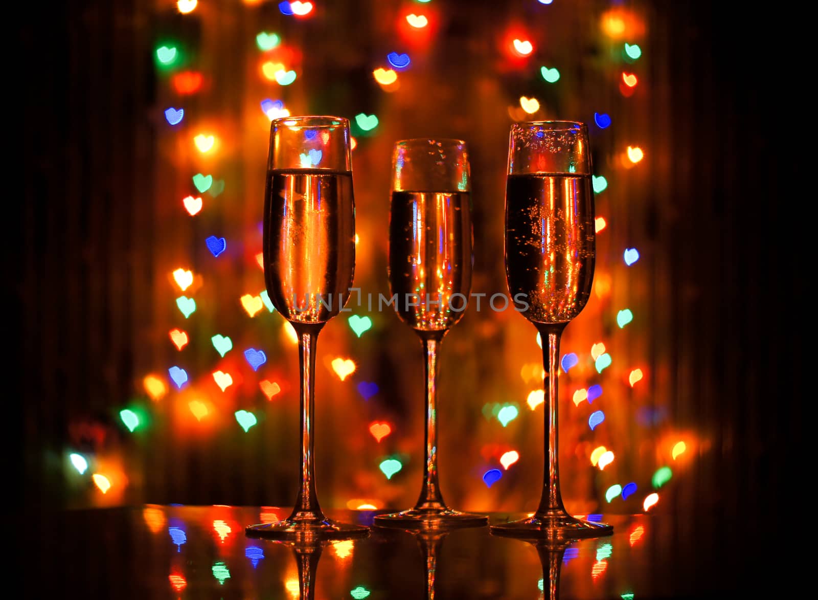 glass of champagne on the background bokeh by serhii_lohvyniuk