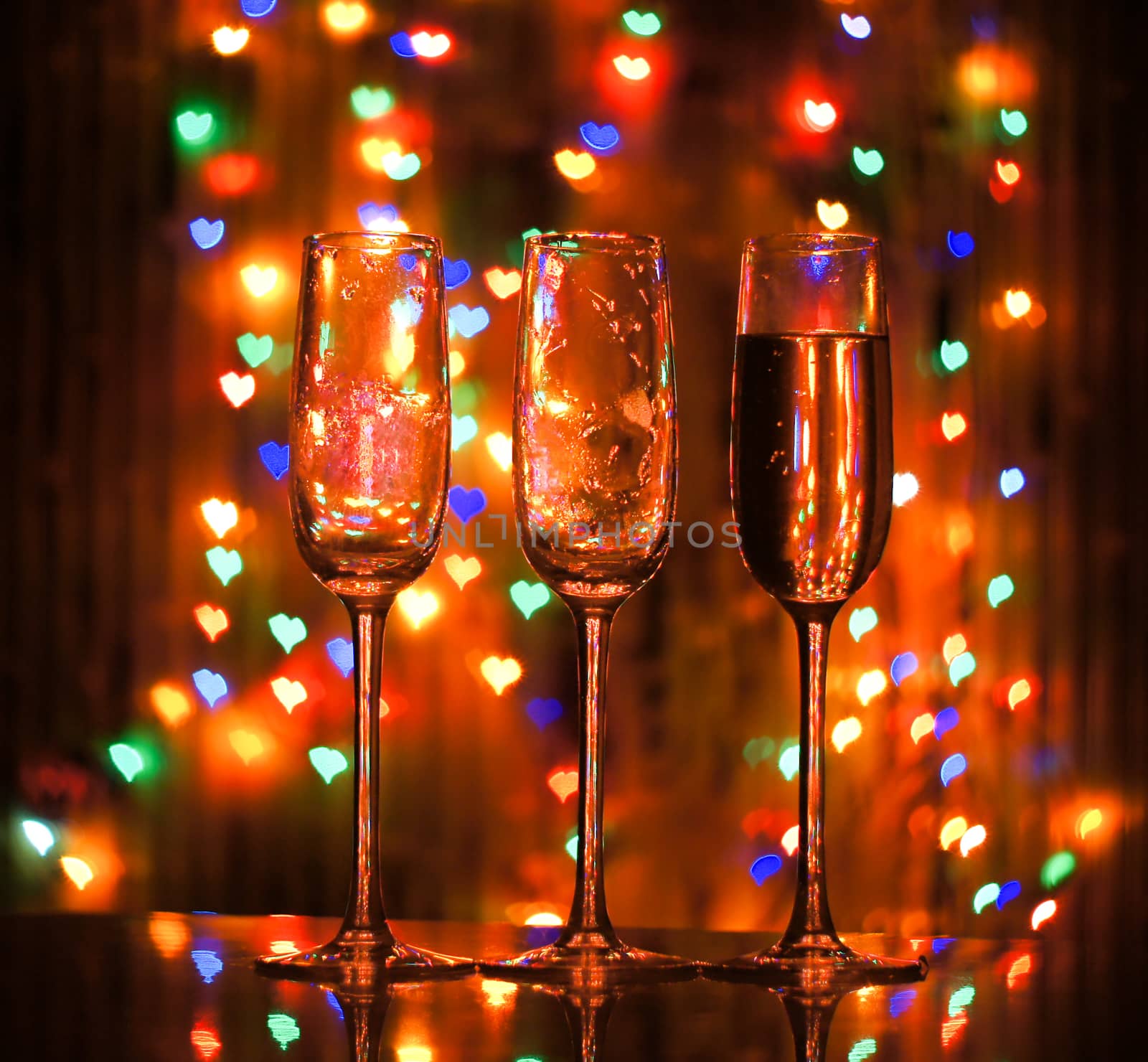 glass of champagne on the background bokeh by serhii_lohvyniuk