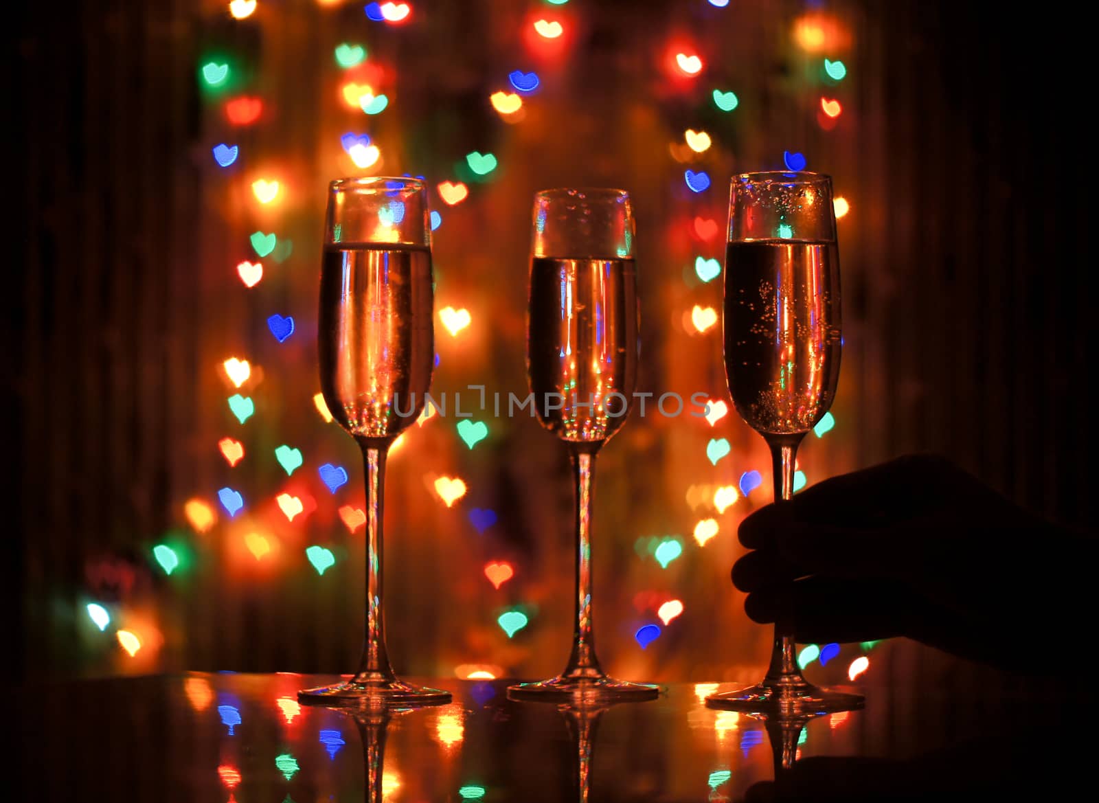 glass of champagne on the background bokeh by serhii_lohvyniuk