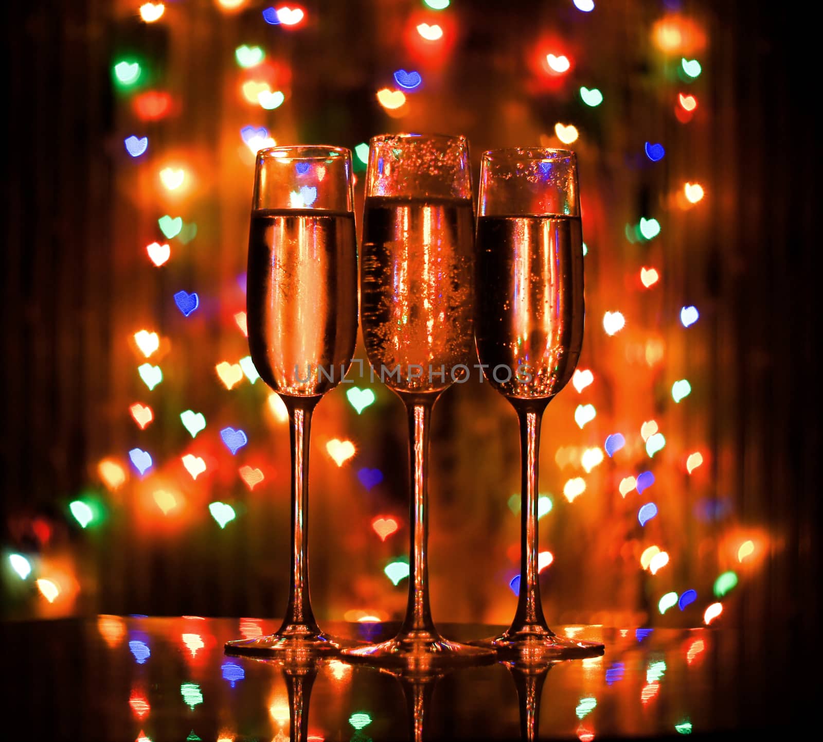 glass of champagne on the background bokeh by serhii_lohvyniuk