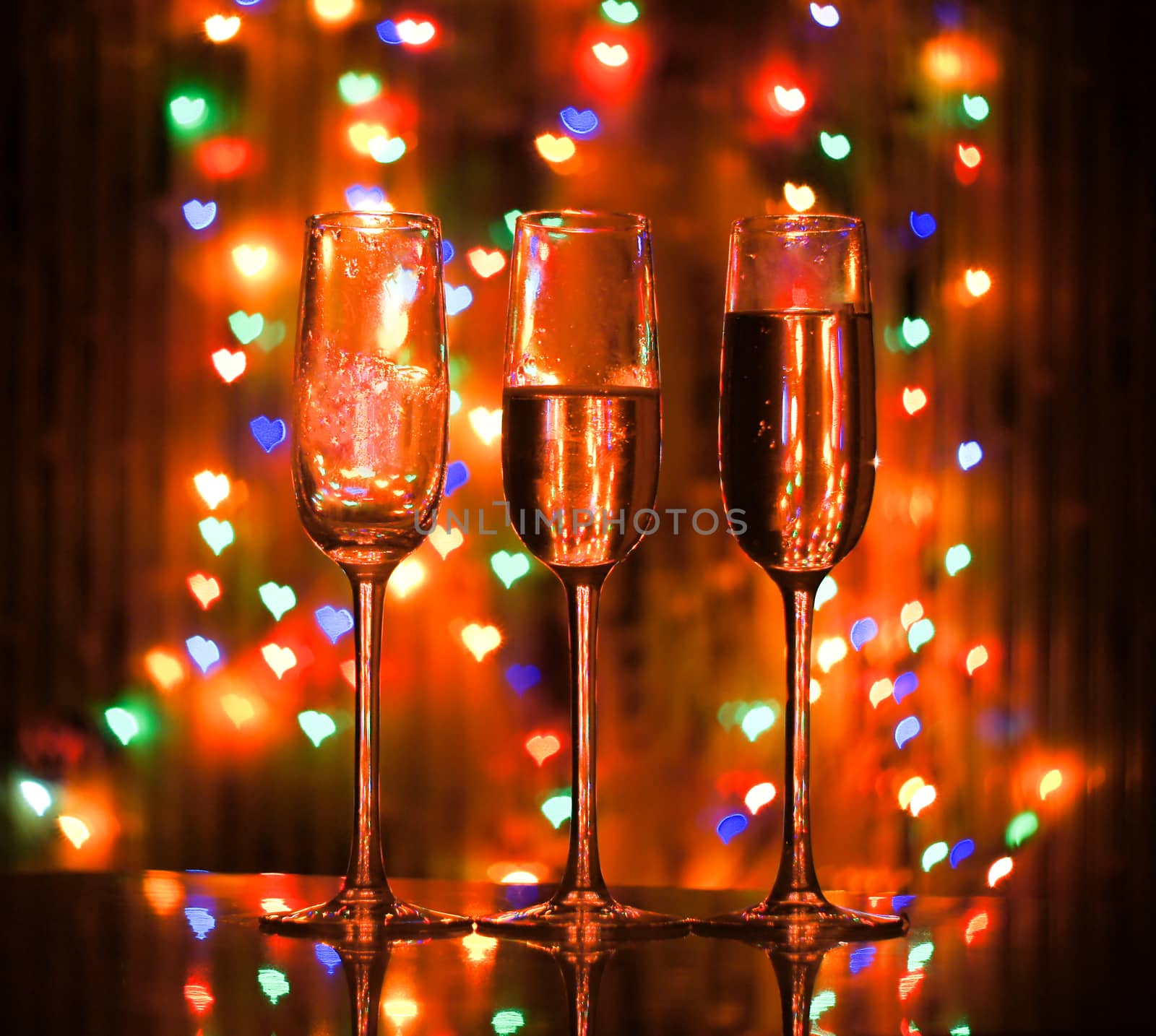 glass of champagne on the background bokeh by serhii_lohvyniuk