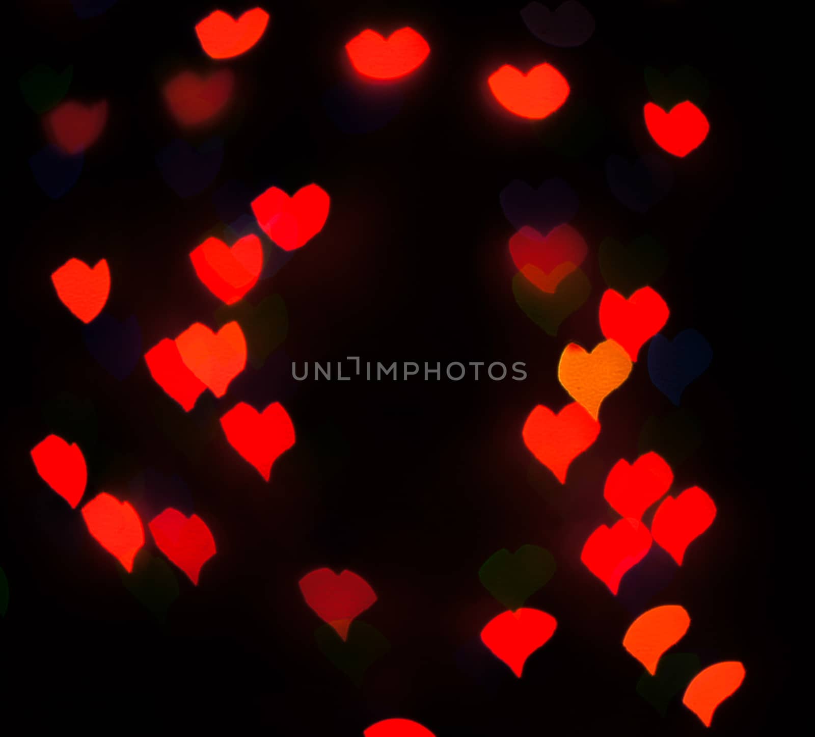 Defocused background lights or bokeh in the form of heart by serhii_lohvyniuk