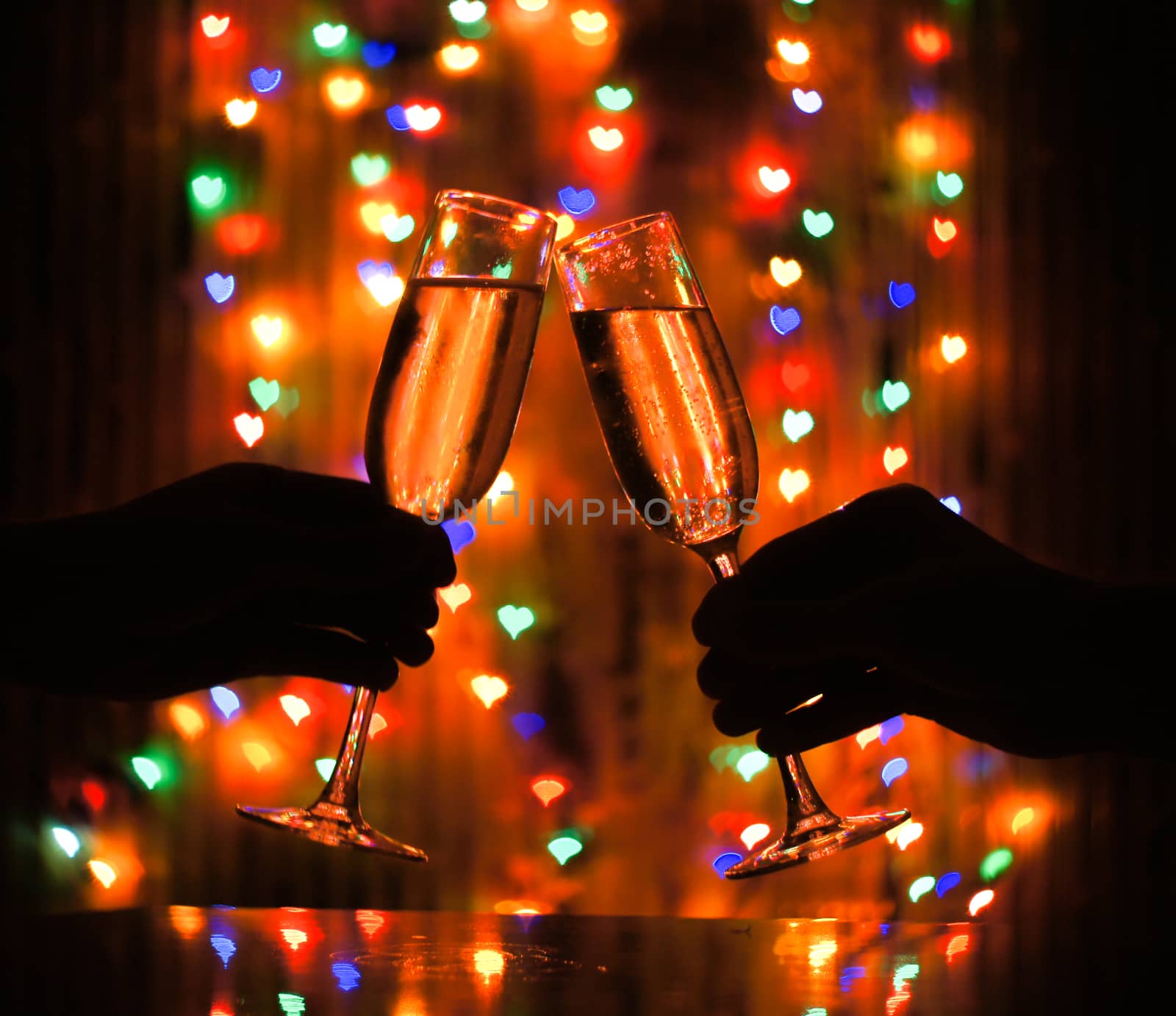 glass of champagne on the background bokeh by serhii_lohvyniuk