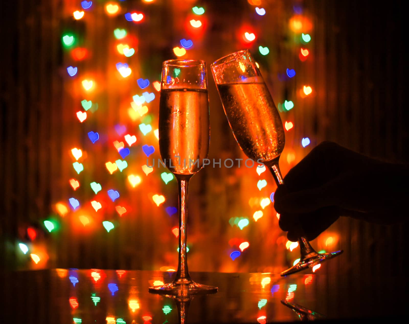 glass of champagne on the background bokeh by serhii_lohvyniuk