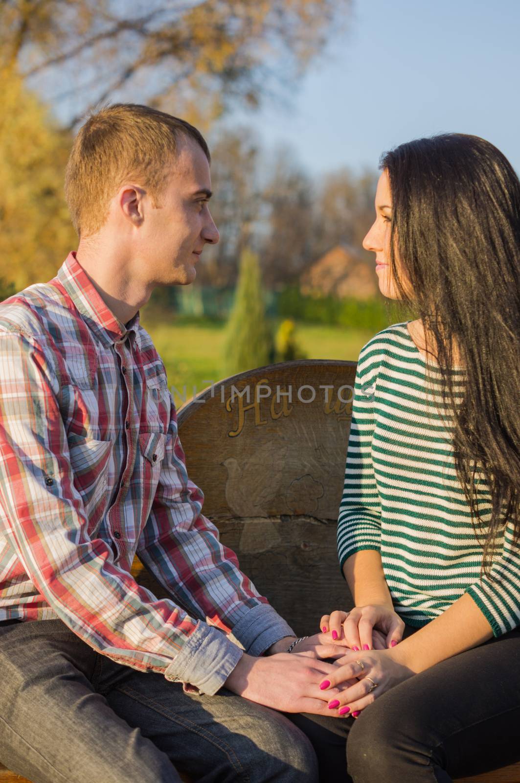 Young couple outdoors by serhii_lohvyniuk