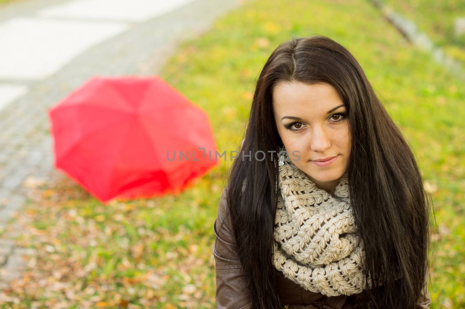 beautiful and sexy girl sitting on bench outdoors. 