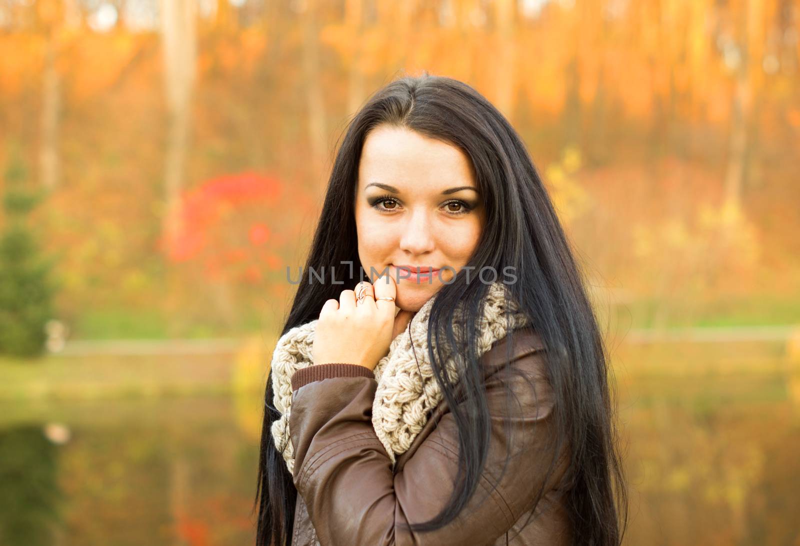 beautiful and sexy girl sitting on bench outdoors. 