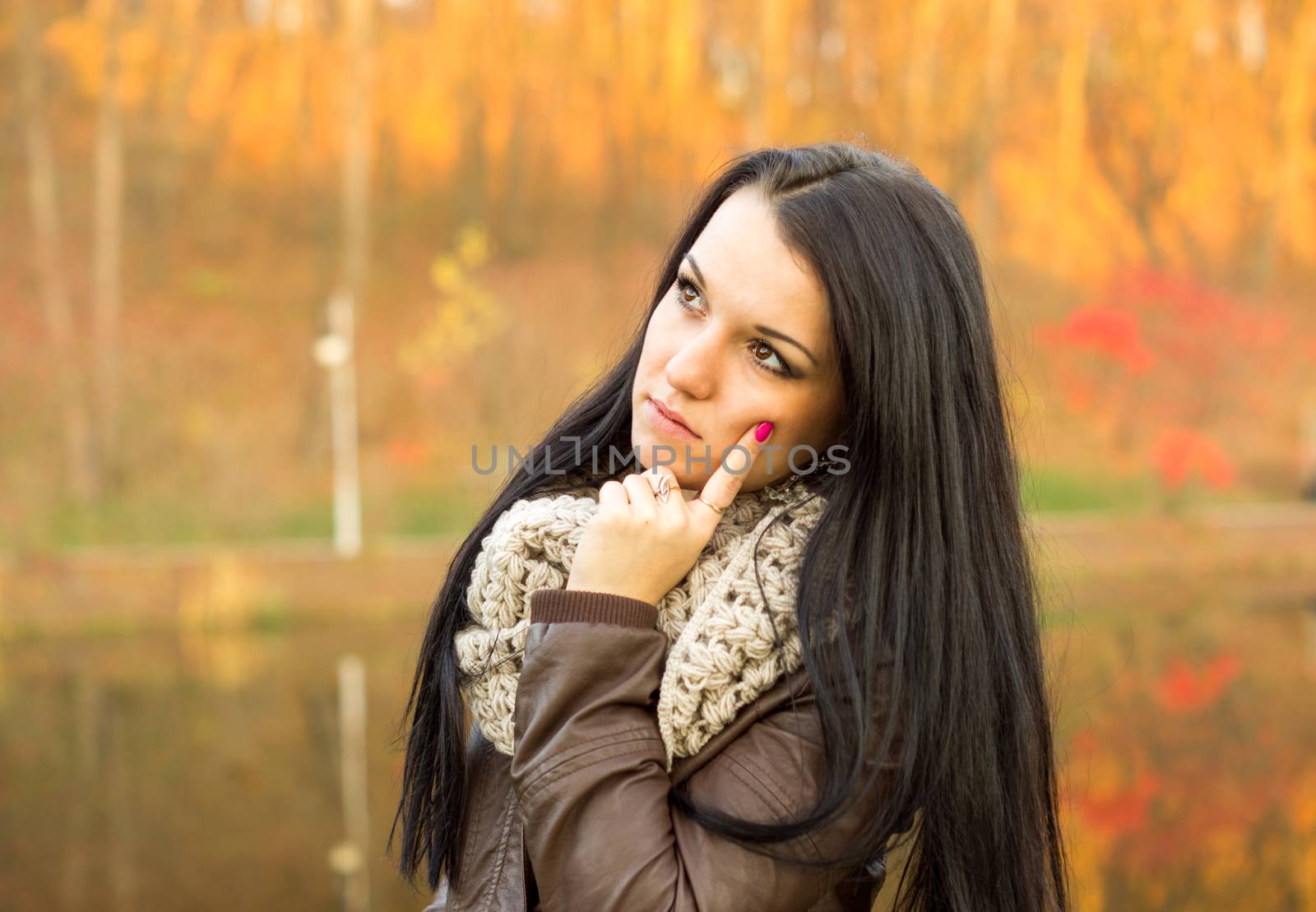 beautiful and sexy girl sitting on bench outdoors by serhii_lohvyniuk