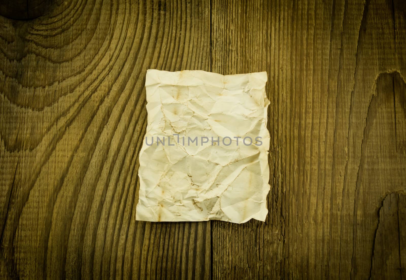 old paper on wood background. For your commercial and editorial use