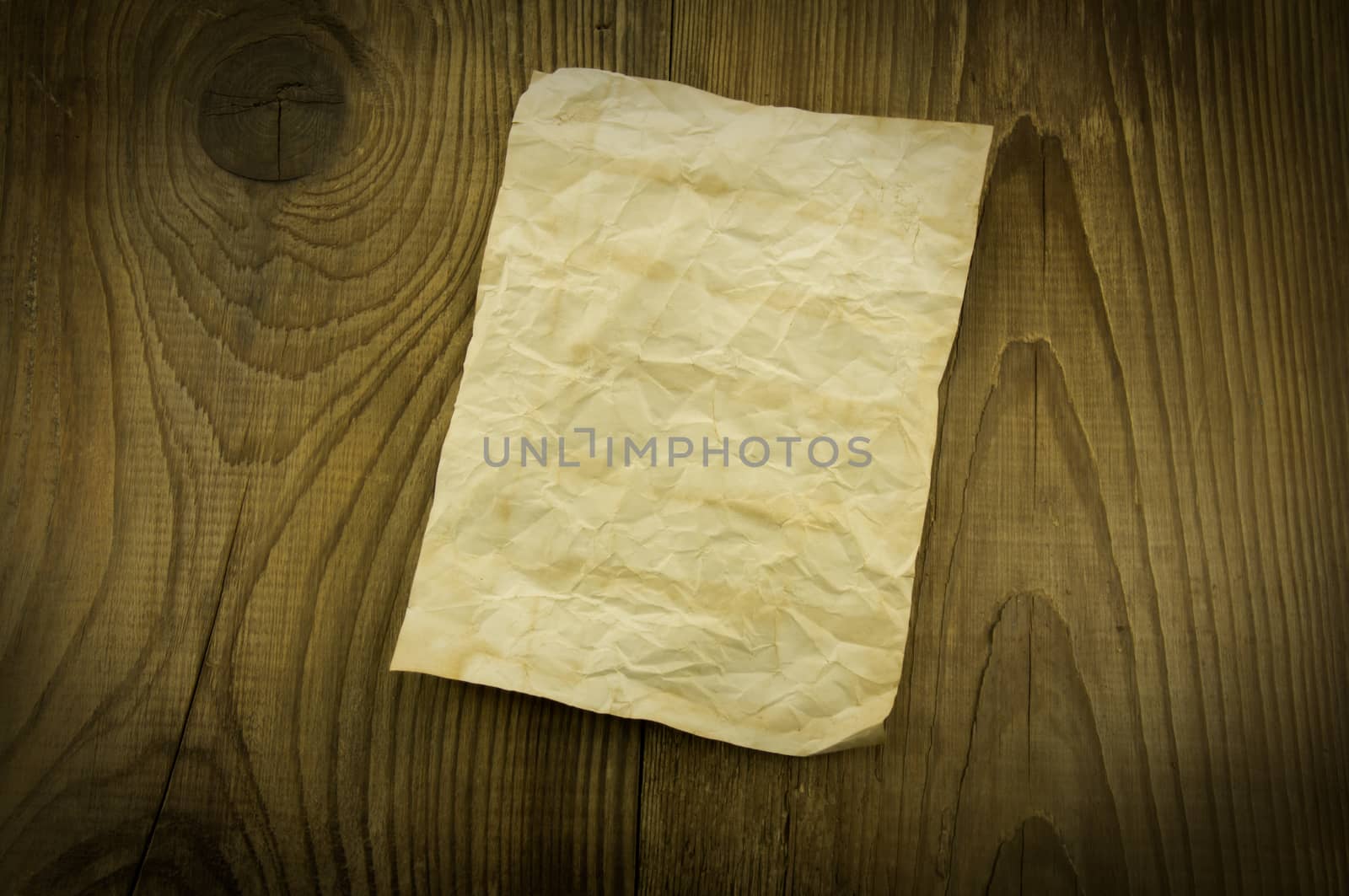 old paper on wood background by serhii_lohvyniuk