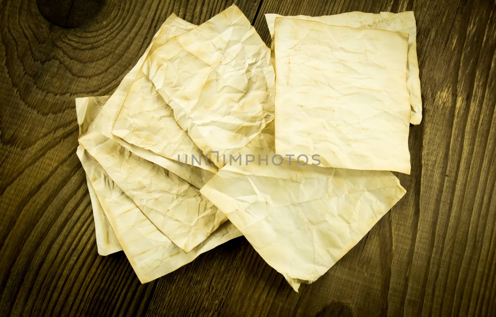 old paper on wood background. For your commercial and editorial use